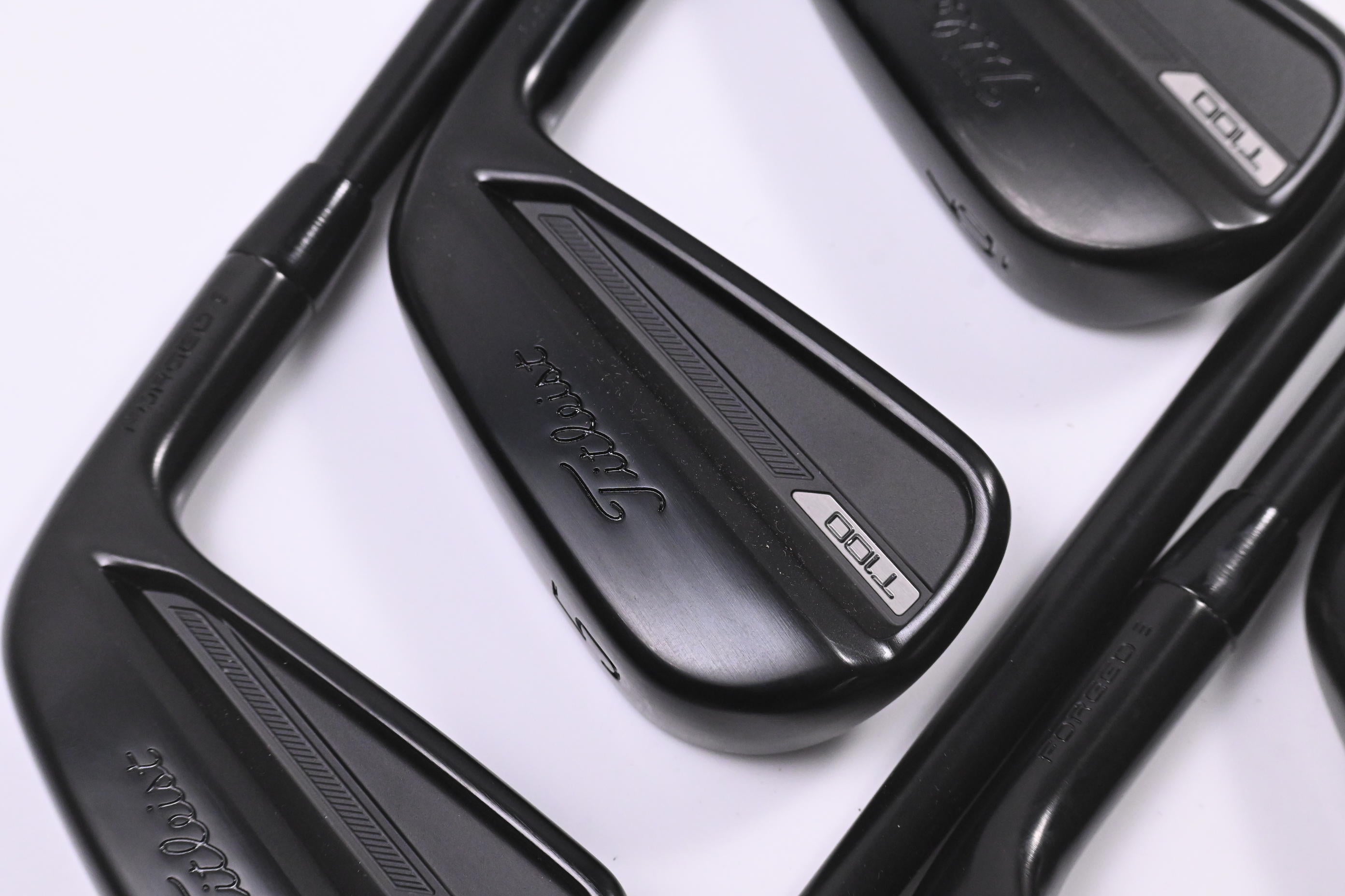 Titleist T100 Black Vapor Irons / 4-PW / Stiff Flex AMT Tour White S300 Shafts