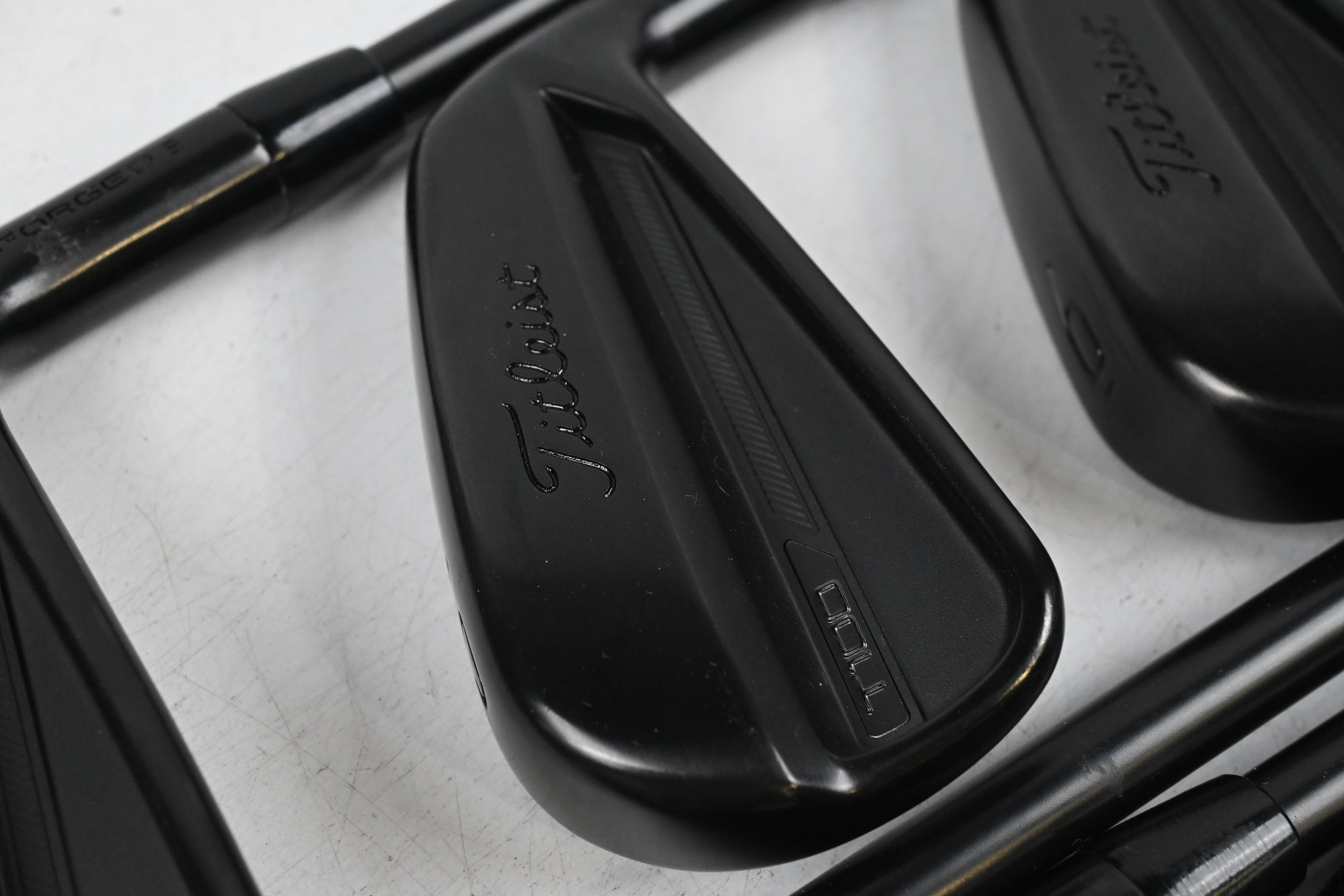 Titleist T100 Black Vapor Irons / 4-PW / Stiff Flex AMT Tour White S300 Shafts