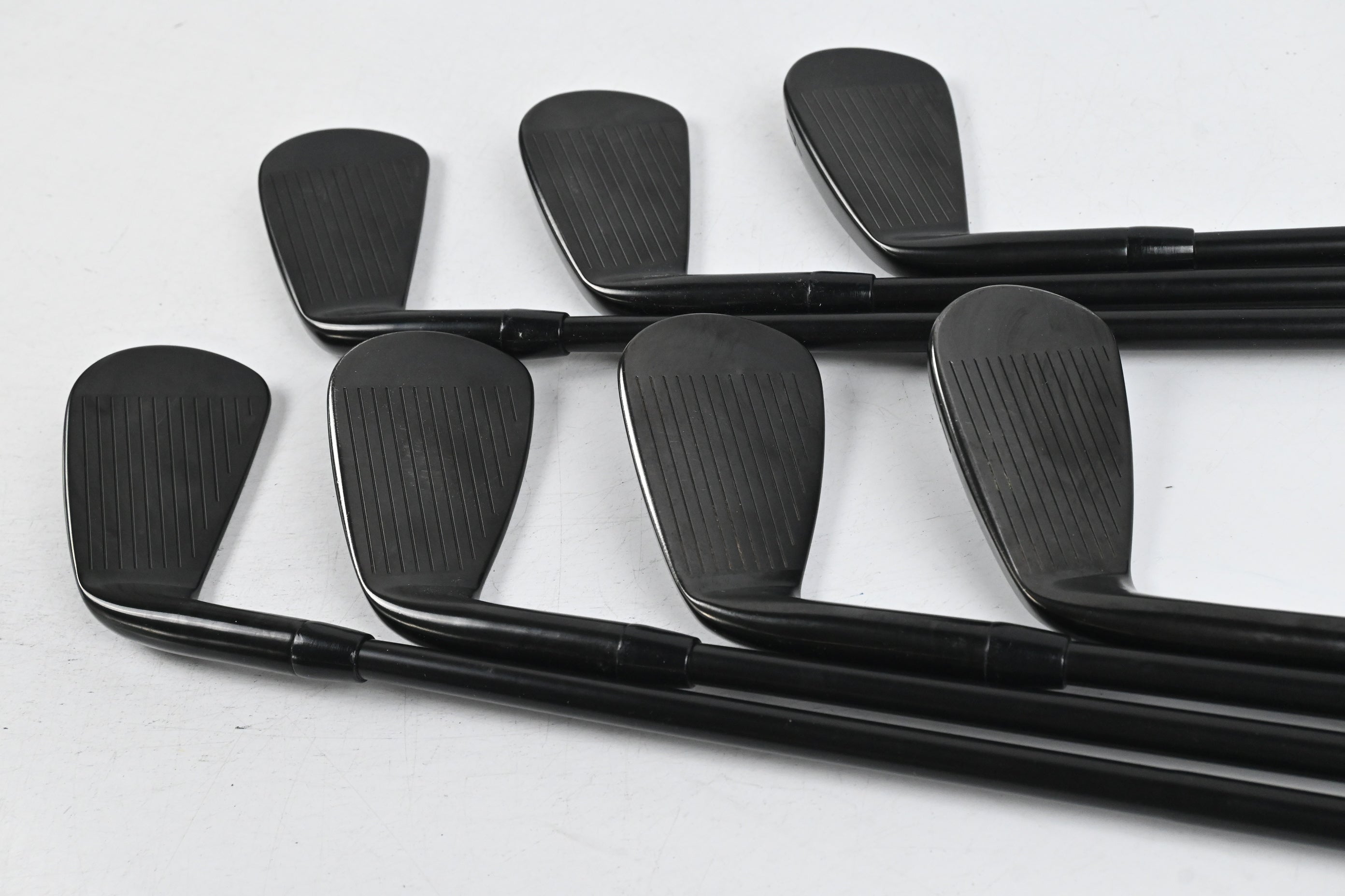 Titleist T100 Black Vapor Irons / 4-PW / Stiff Flex AMT Tour White S300 Shafts