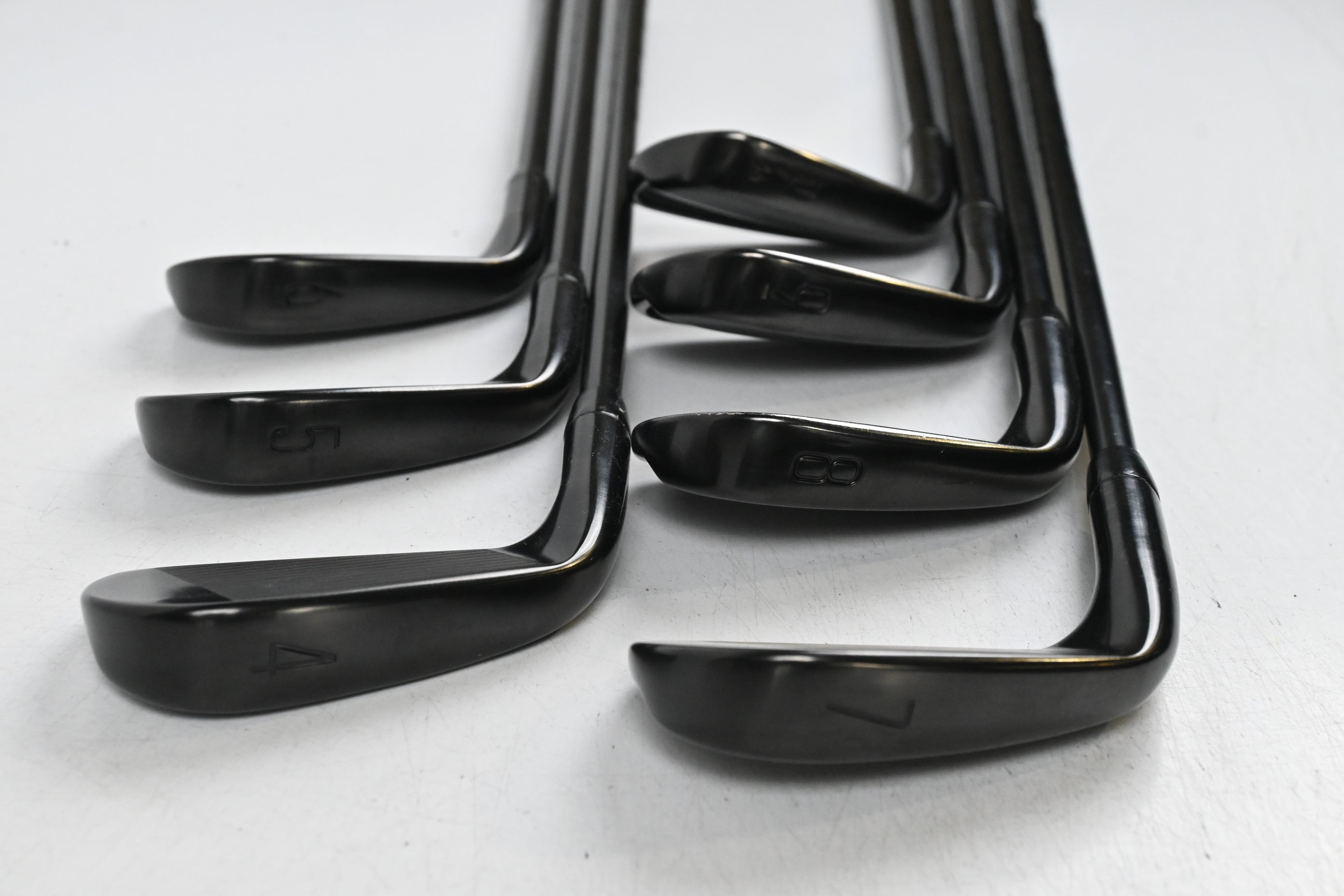 Titleist T100 Black Vapor Irons / 4-PW / Stiff Flex AMT Tour White S300 Shafts