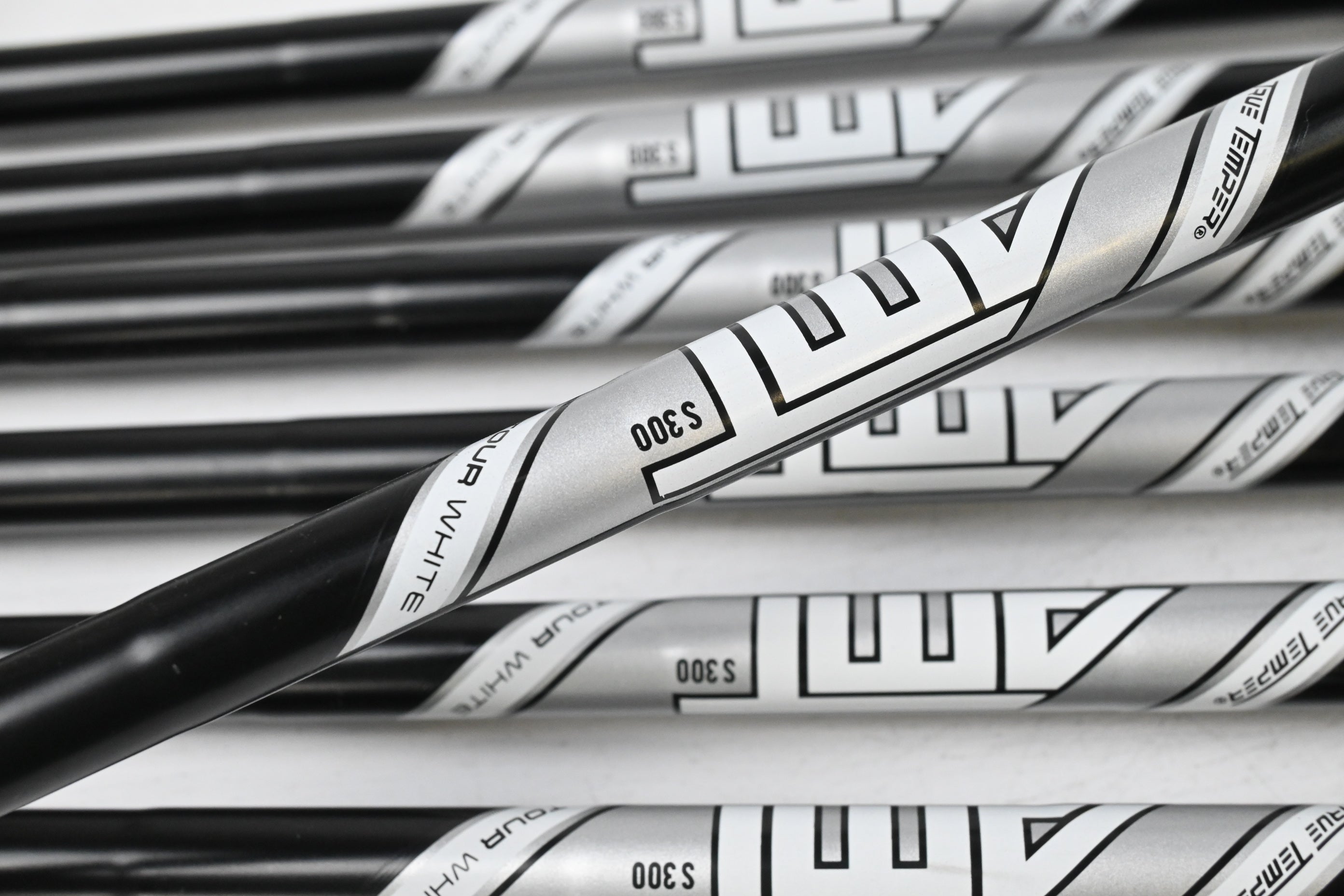 Titleist T100 Black Vapor Irons / 4-PW / Stiff Flex AMT Tour White S300 Shafts