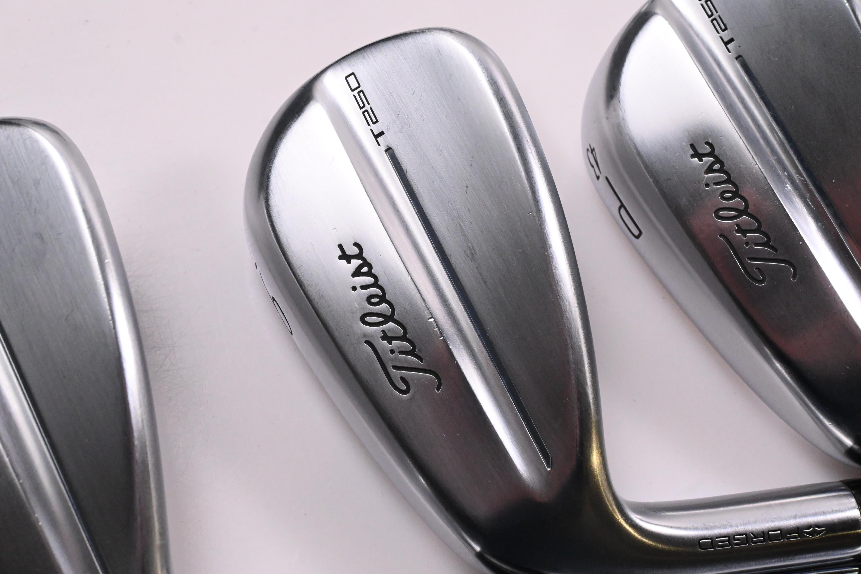Left Hand Titleist T250 2025 Irons / 5-PW+48° / Regular Flex AMT Black Shafts