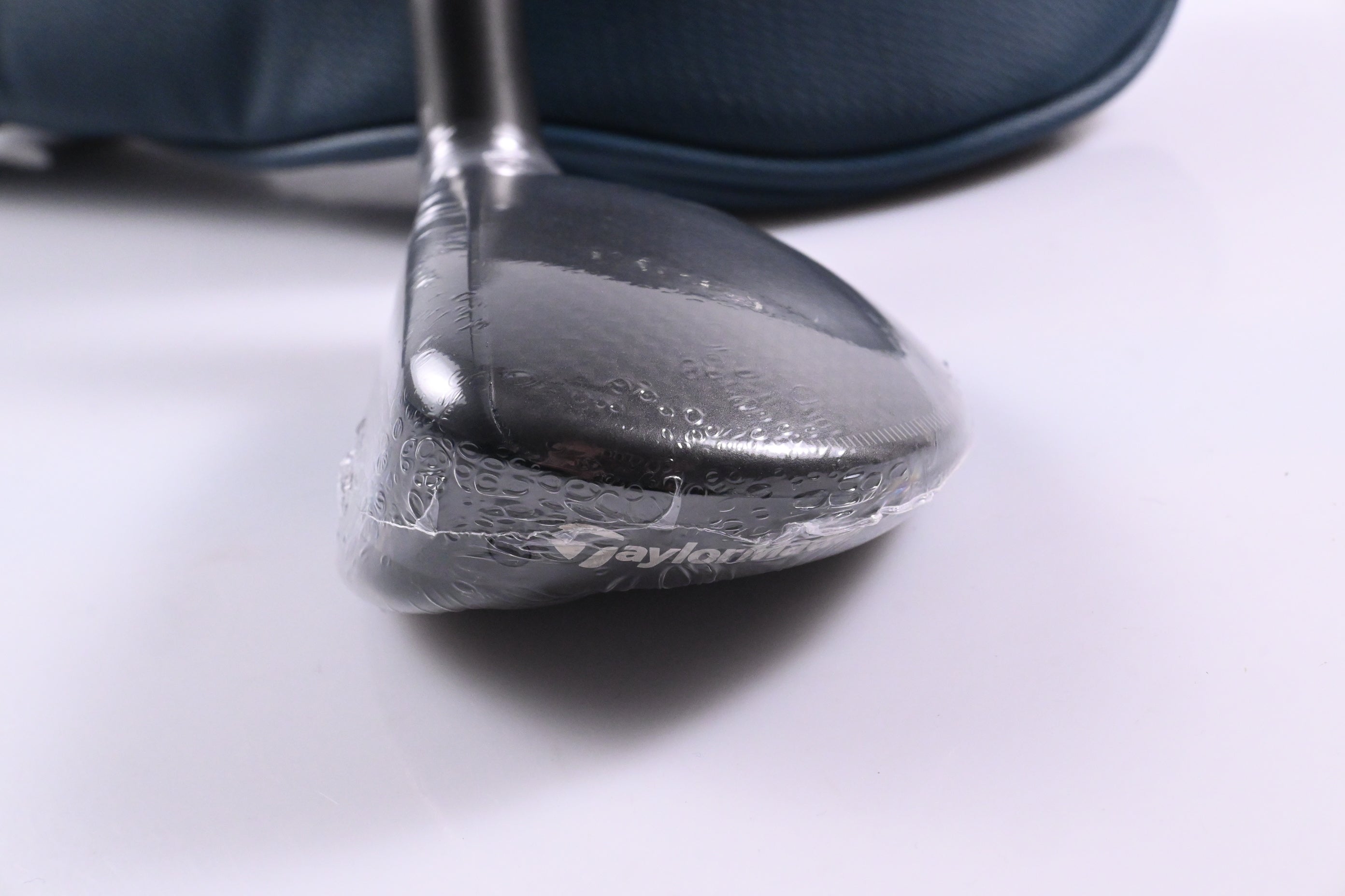 Left Hand Taylormade Qi4D Max Lite #4 Hybrid / 22 Degree / Regular Flex Reax 65