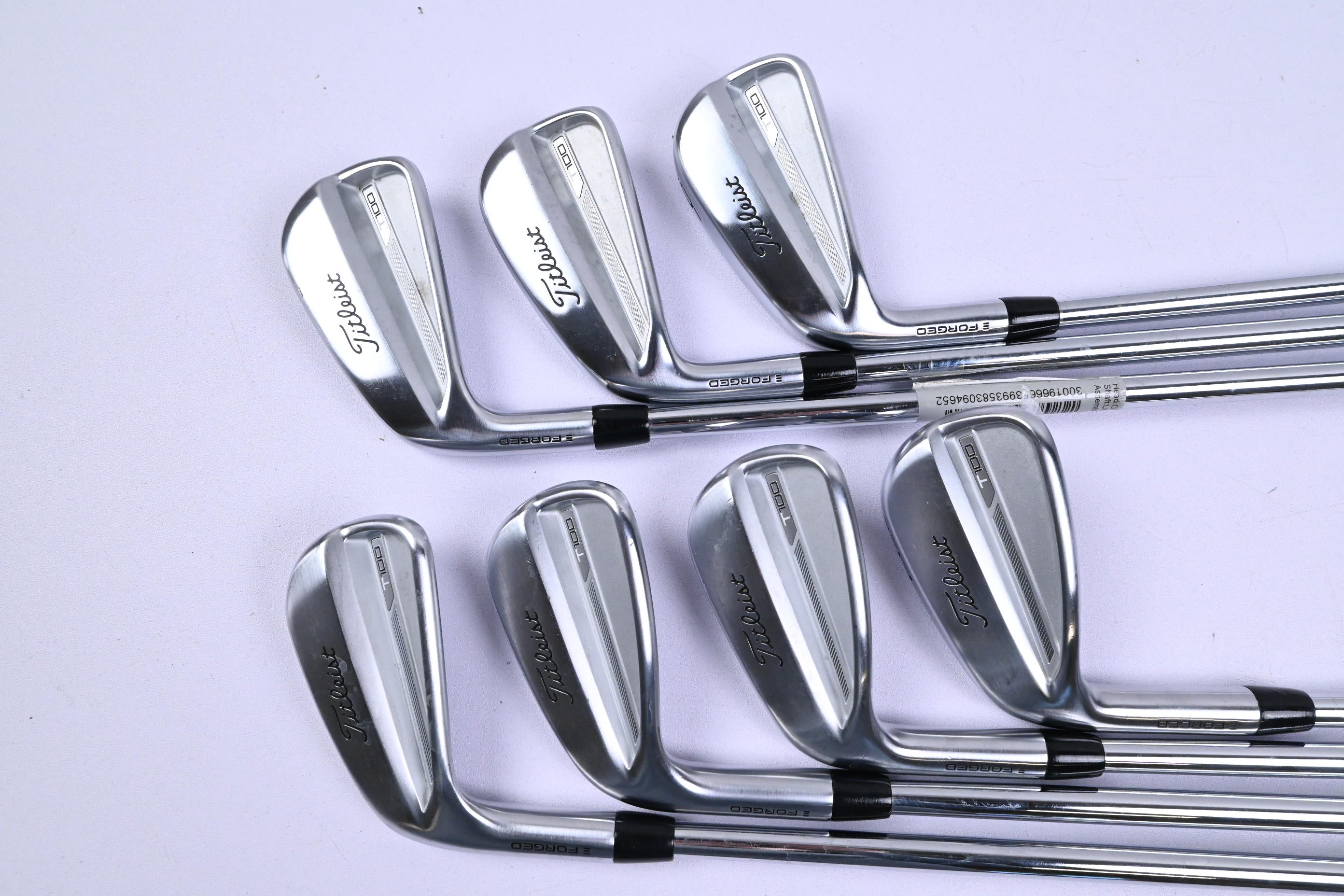 Left Hand Titleist T100 2023 Irons / 4-PW / Stiff Flex AMT White S300 Shafts