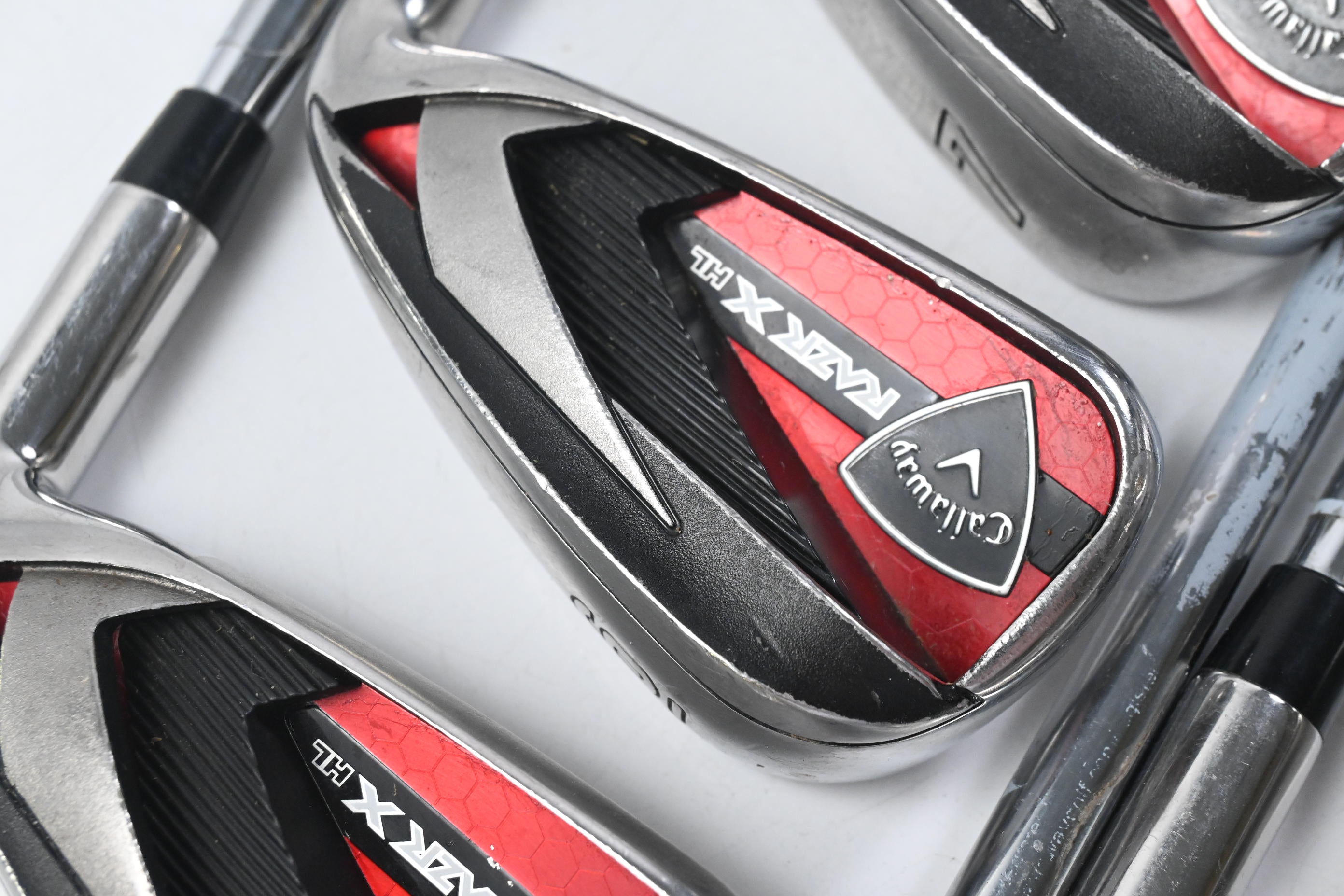 Callaway RAZR X HL Irons / 5-PW+SW / Uniflex M-10 XP Shafts