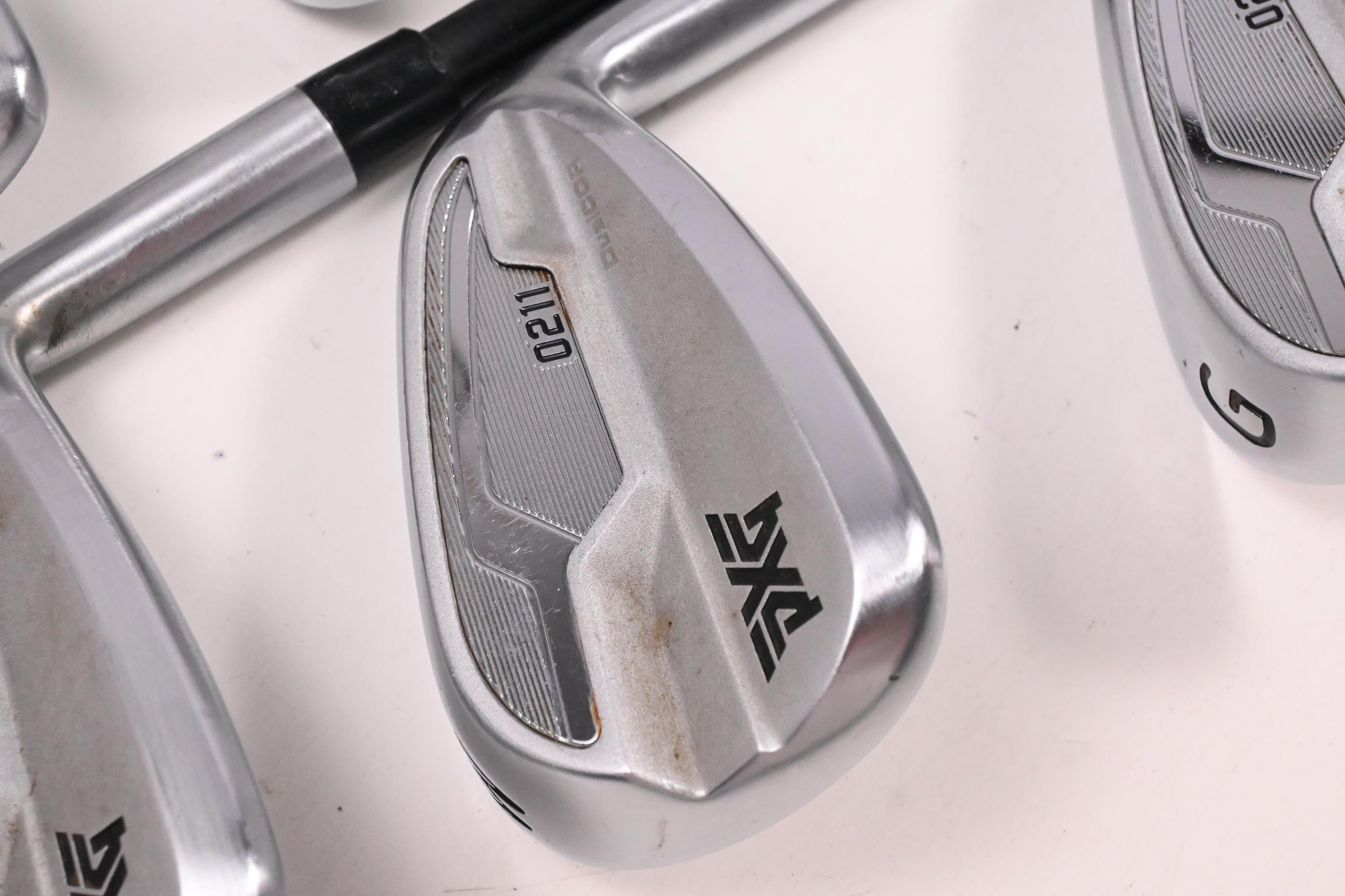 PXG 0211 DC Irons / 7-PW+GW / Regular Flex MMT 70 Shafts