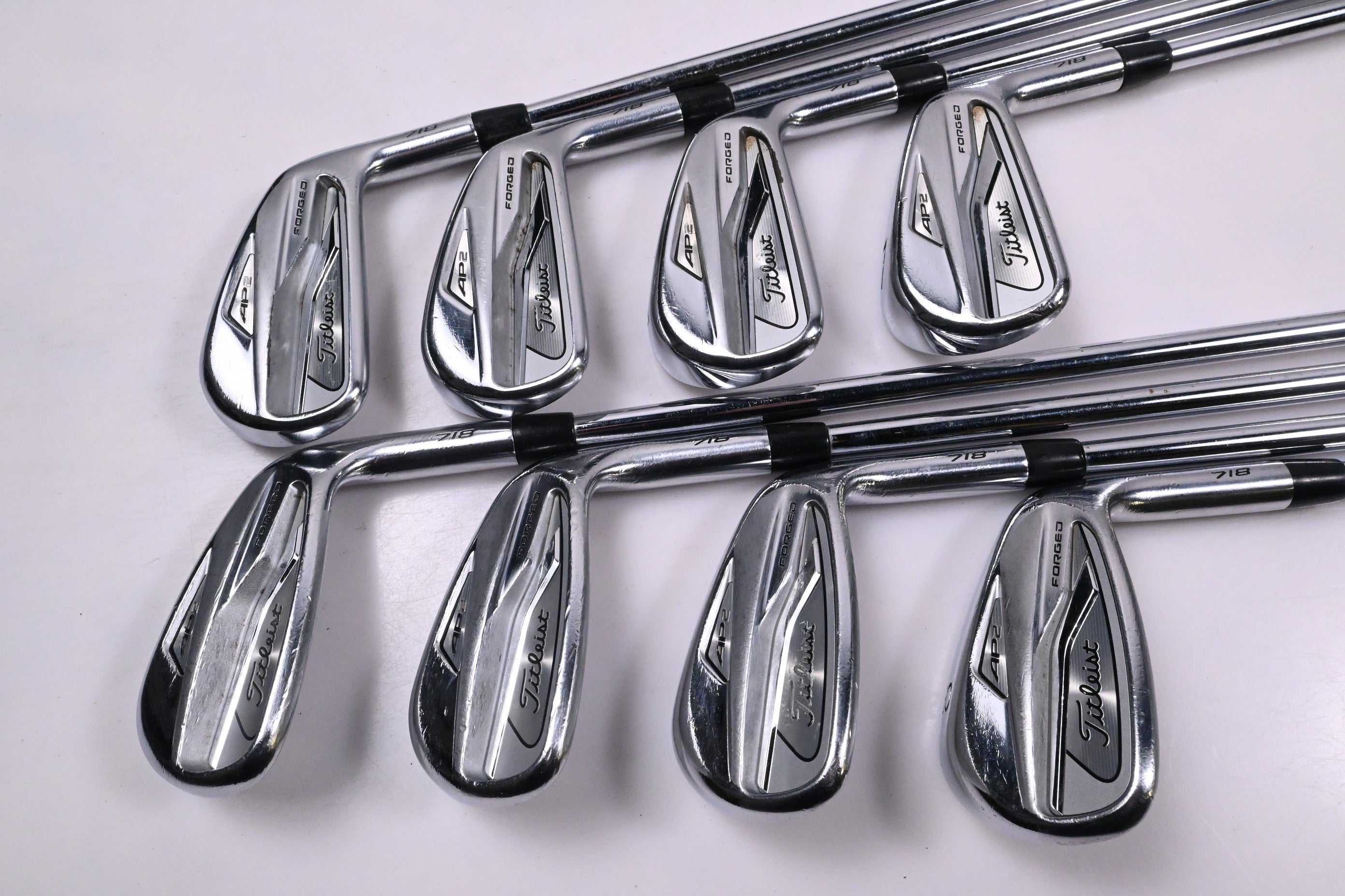Titleist 718 AP2 Irons / 4-PW+50° / Regular Flex AMT Tour White R300 Shafts