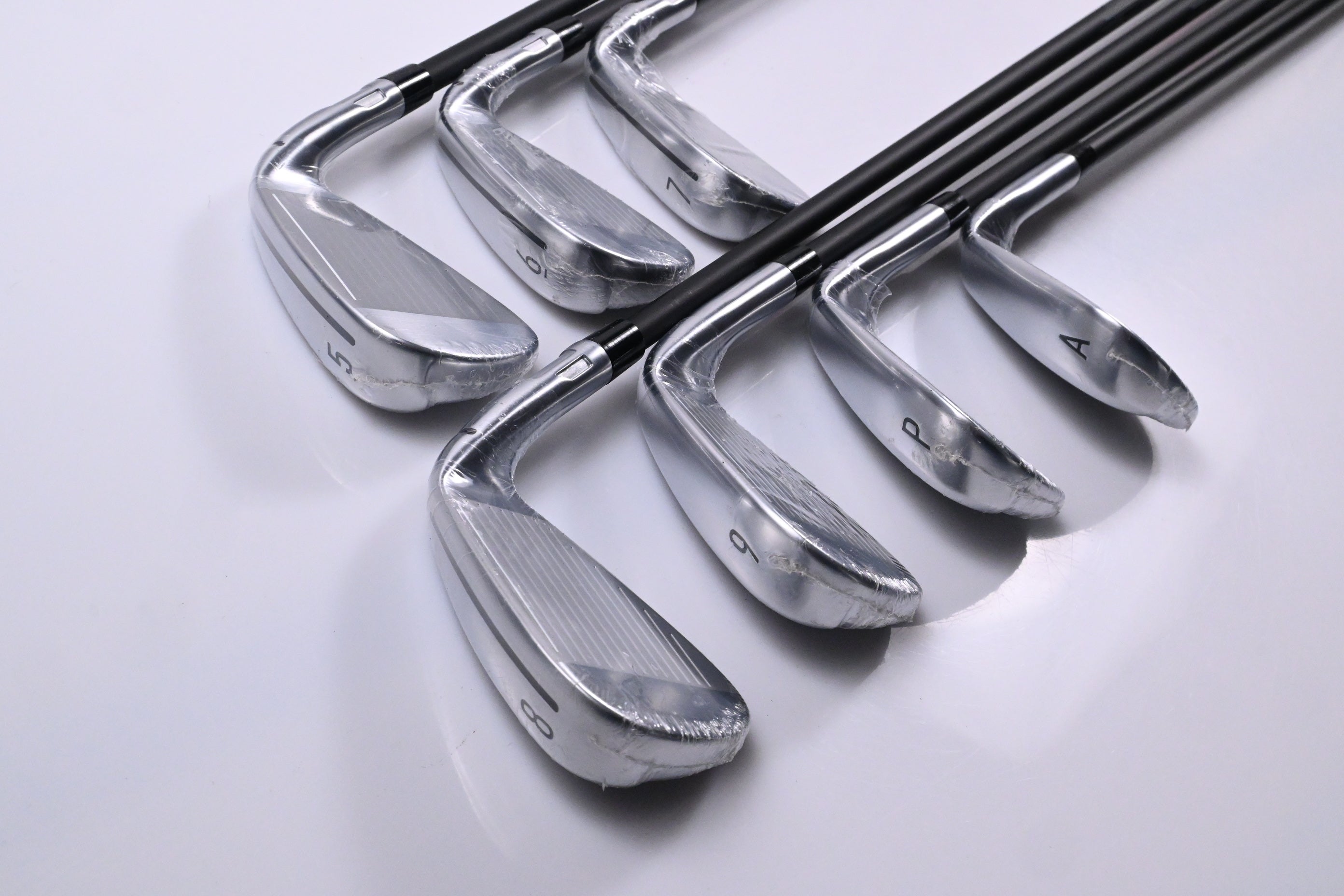 Left Hand Taylormade Qi Irons / 5-PW+GW / Regular Flex KBS REAX 65 White Shafts
