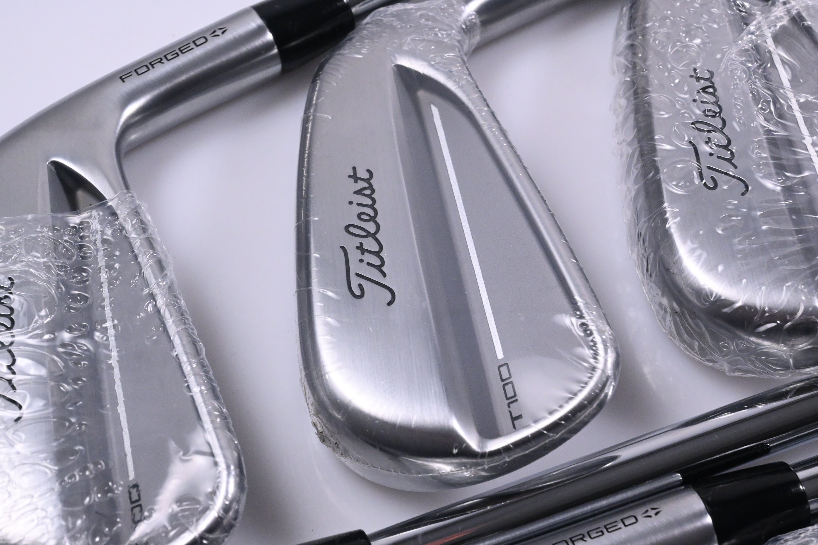 Titleist T100 2025 Irons / 4-PW / Stiff Flex AMT White Shafts