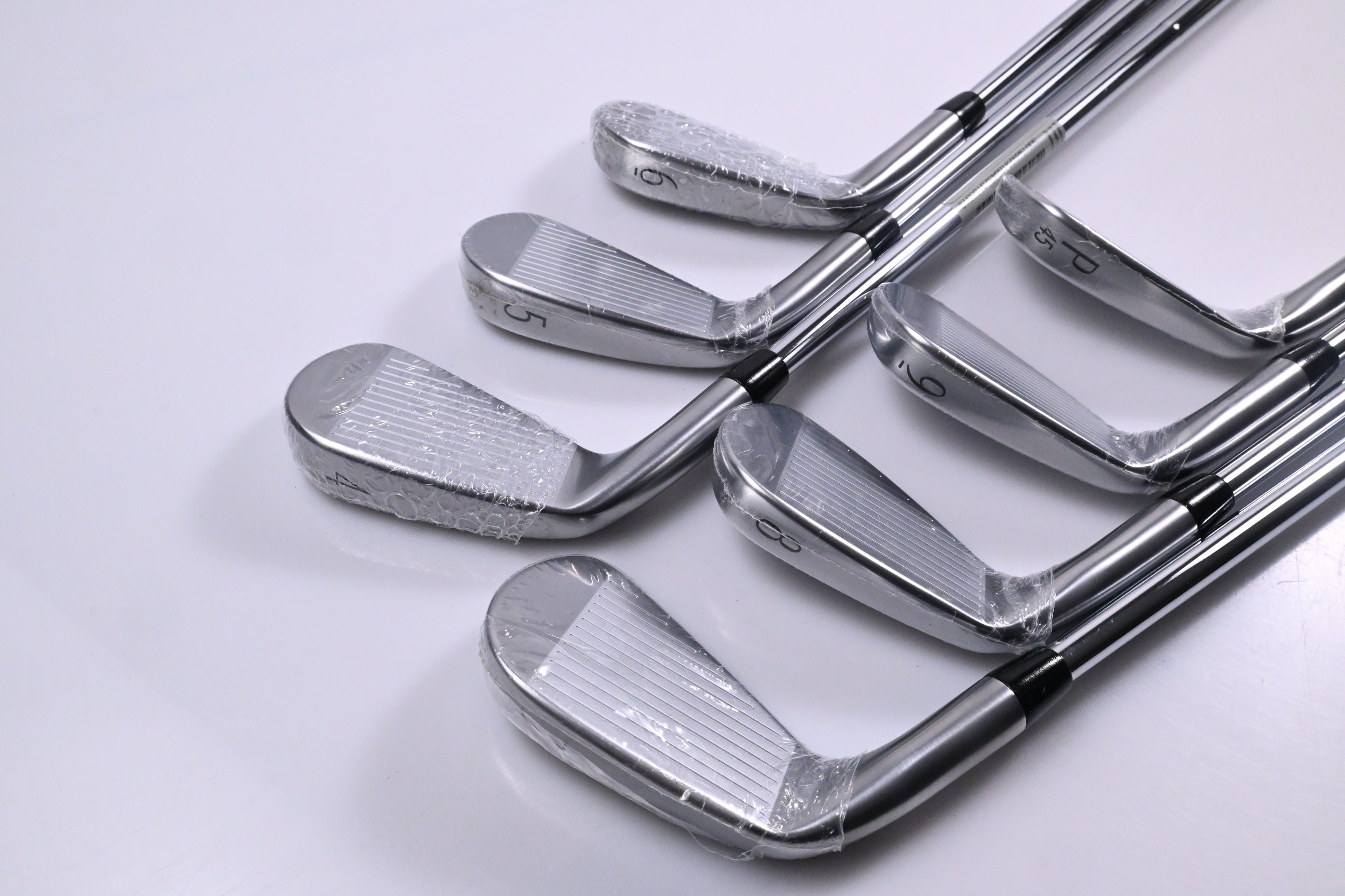 Titleist T100 2025 Irons / 4-PW / Stiff Flex AMT White Shafts