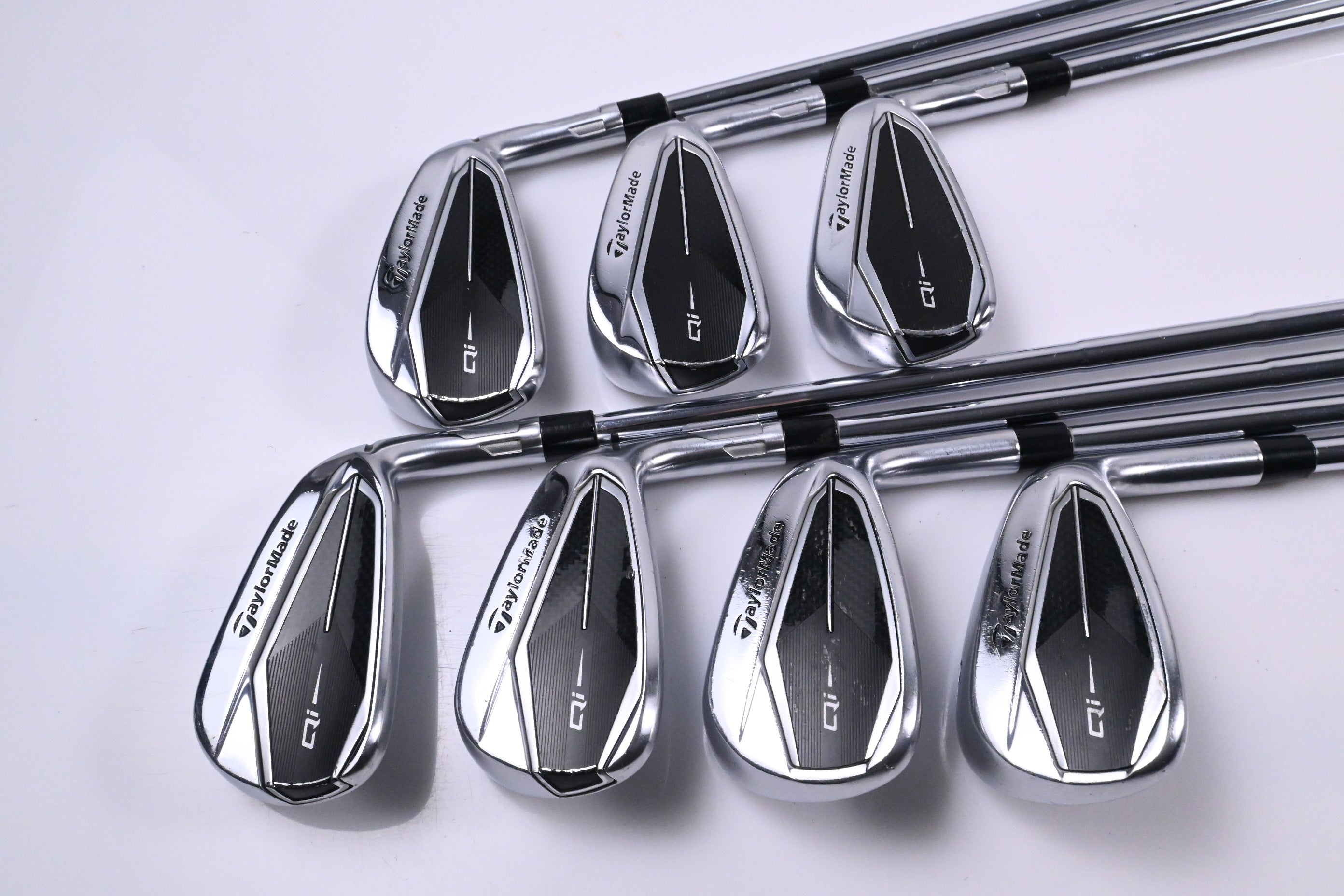 Taylormade Qi Irons / 4-PW / Stiff Flex Dynamic Gold MID 115 S300 Shafts