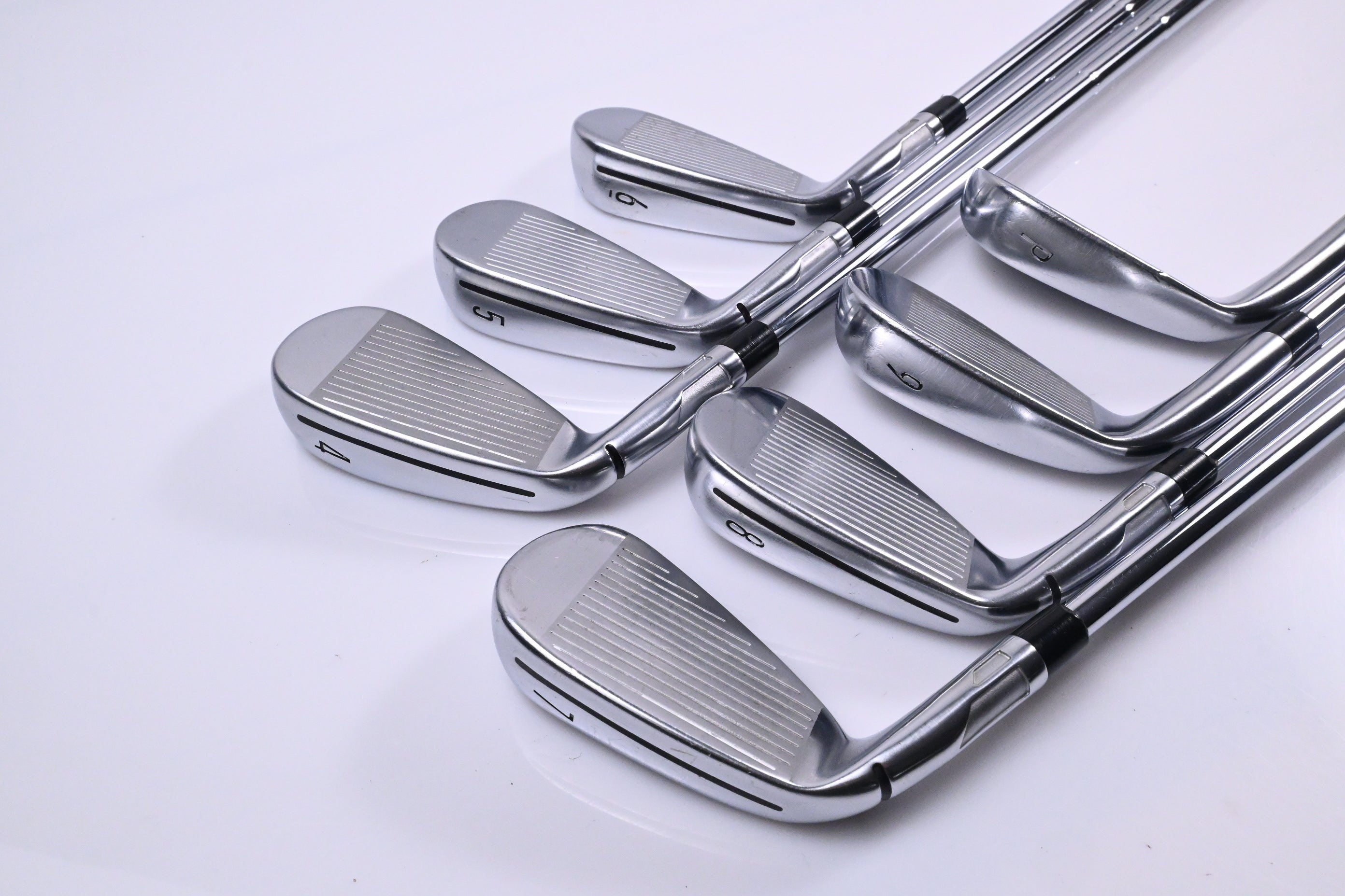 Taylormade Qi Irons / 4-PW / Stiff Flex Dynamic Gold MID 115 S300 Shafts