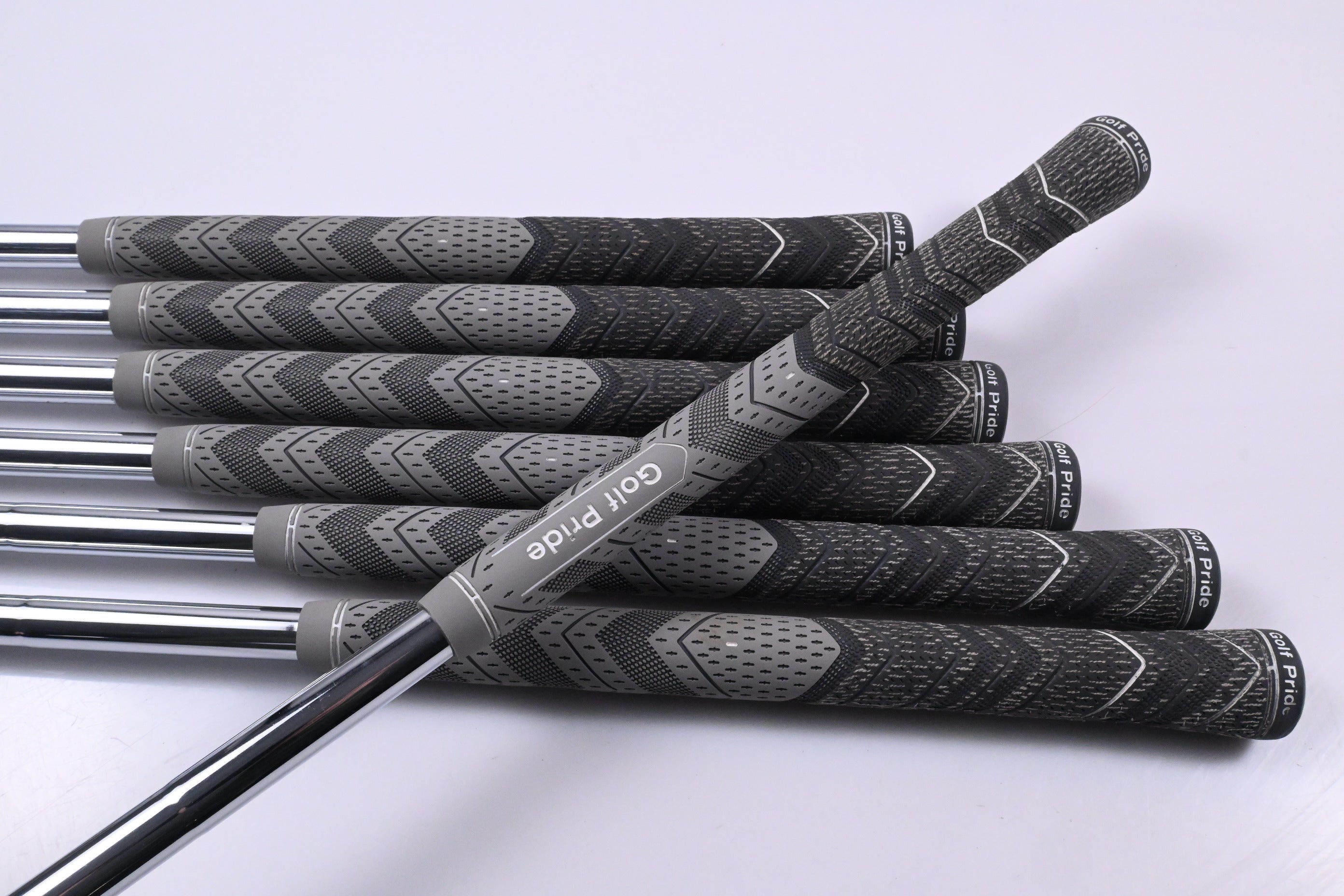 Taylormade Qi Irons / 4-PW / Stiff Flex Dynamic Gold MID 115 S300 Shafts