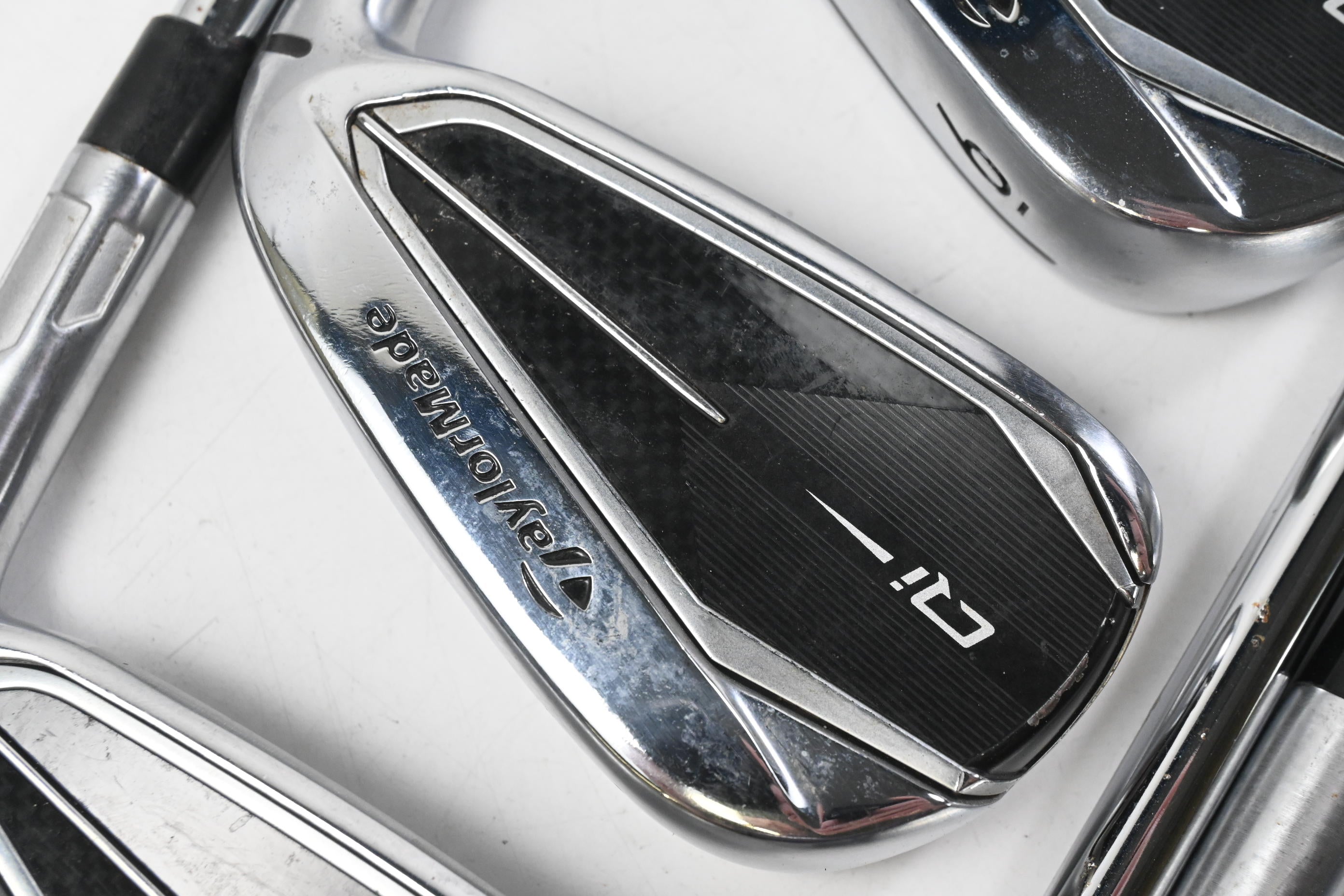 Taylormade Qi Irons / 4-PW+GW+SW / Stiff Flex Elevate MPH 95 Shafts