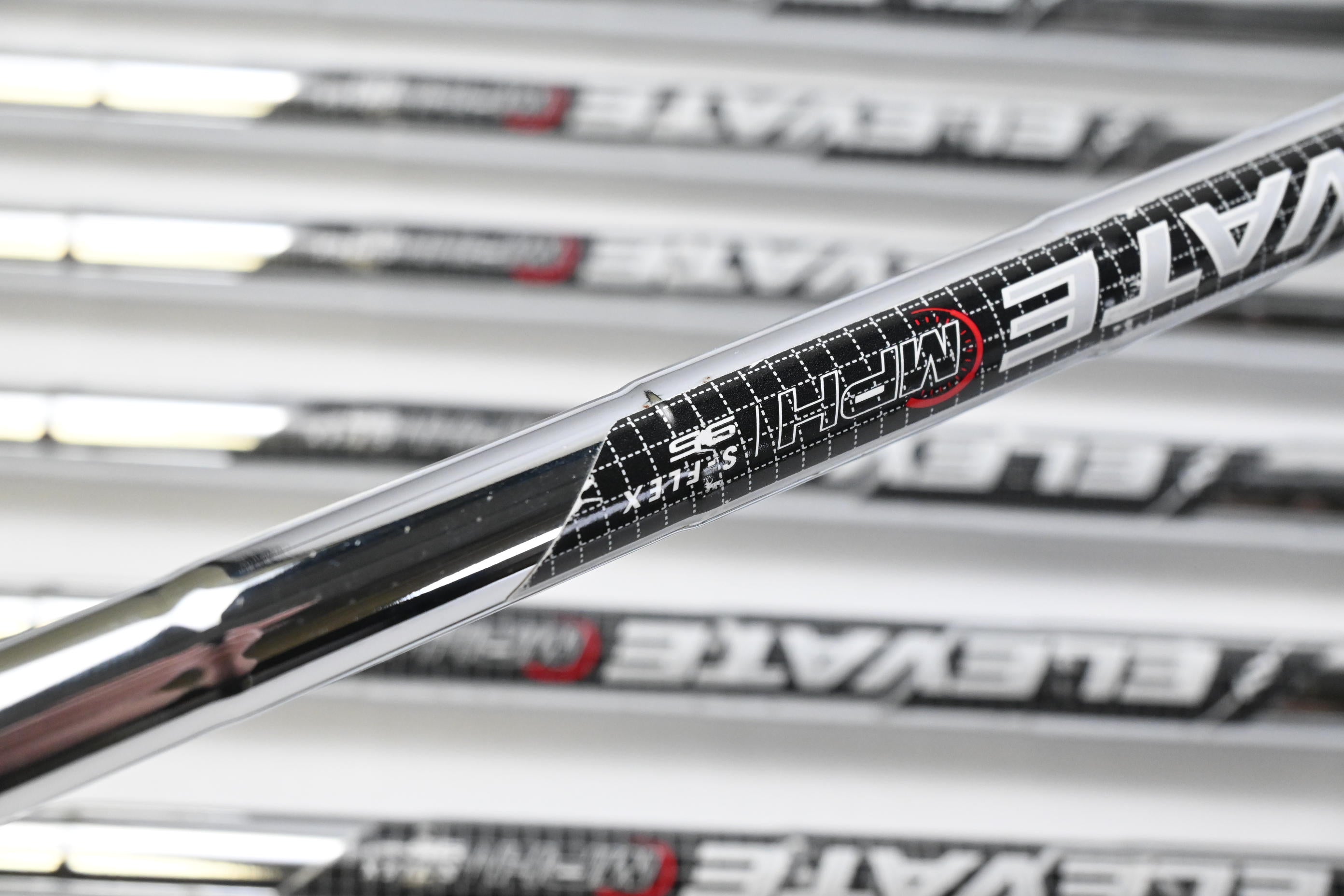 Taylormade Qi Irons / 4-PW+GW+SW / Stiff Flex Elevate MPH 95 Shafts