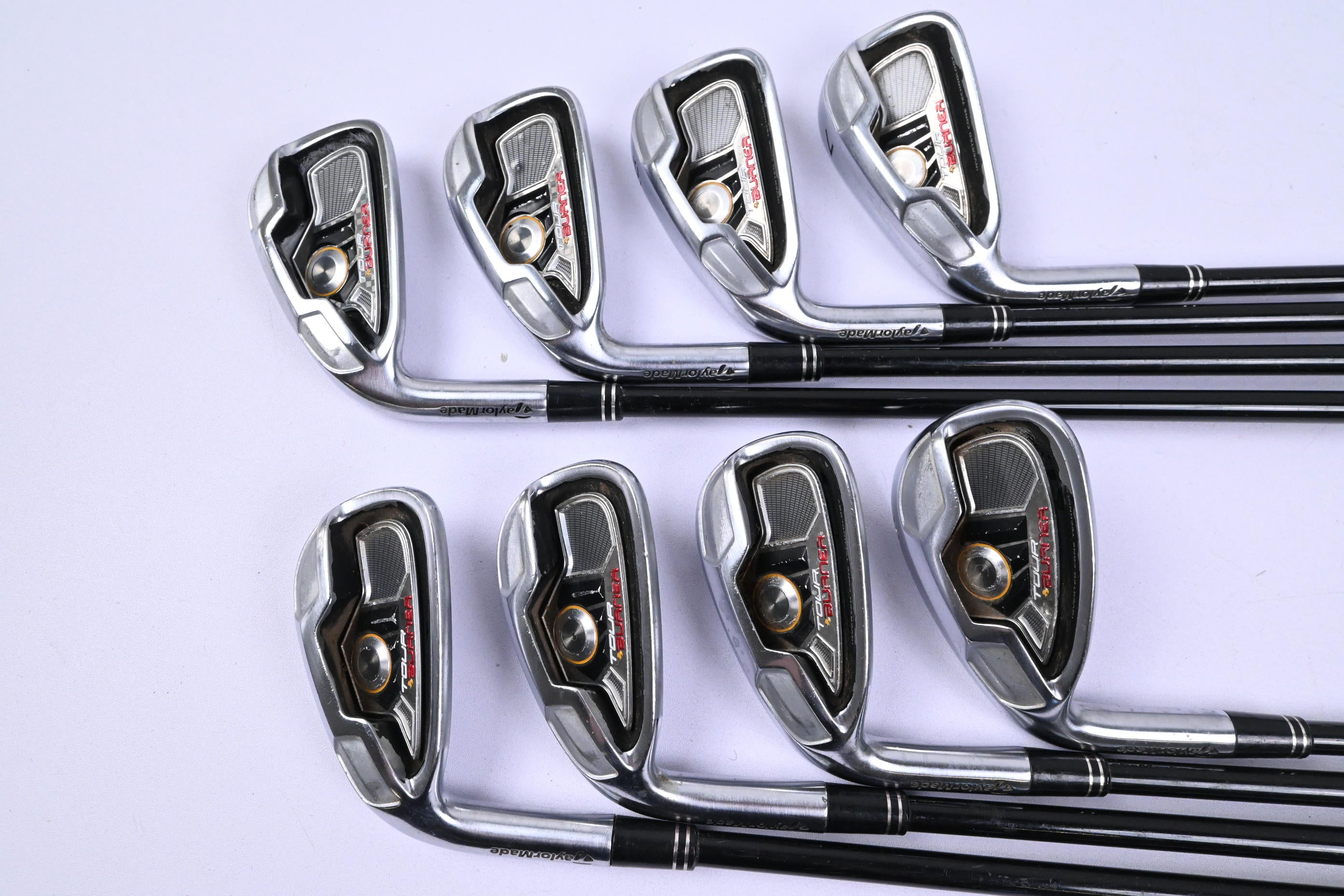 Left Hand Taylormade Tour Burner Irons / 4-PW+SW / Regular Flex REAX 65 Shafts