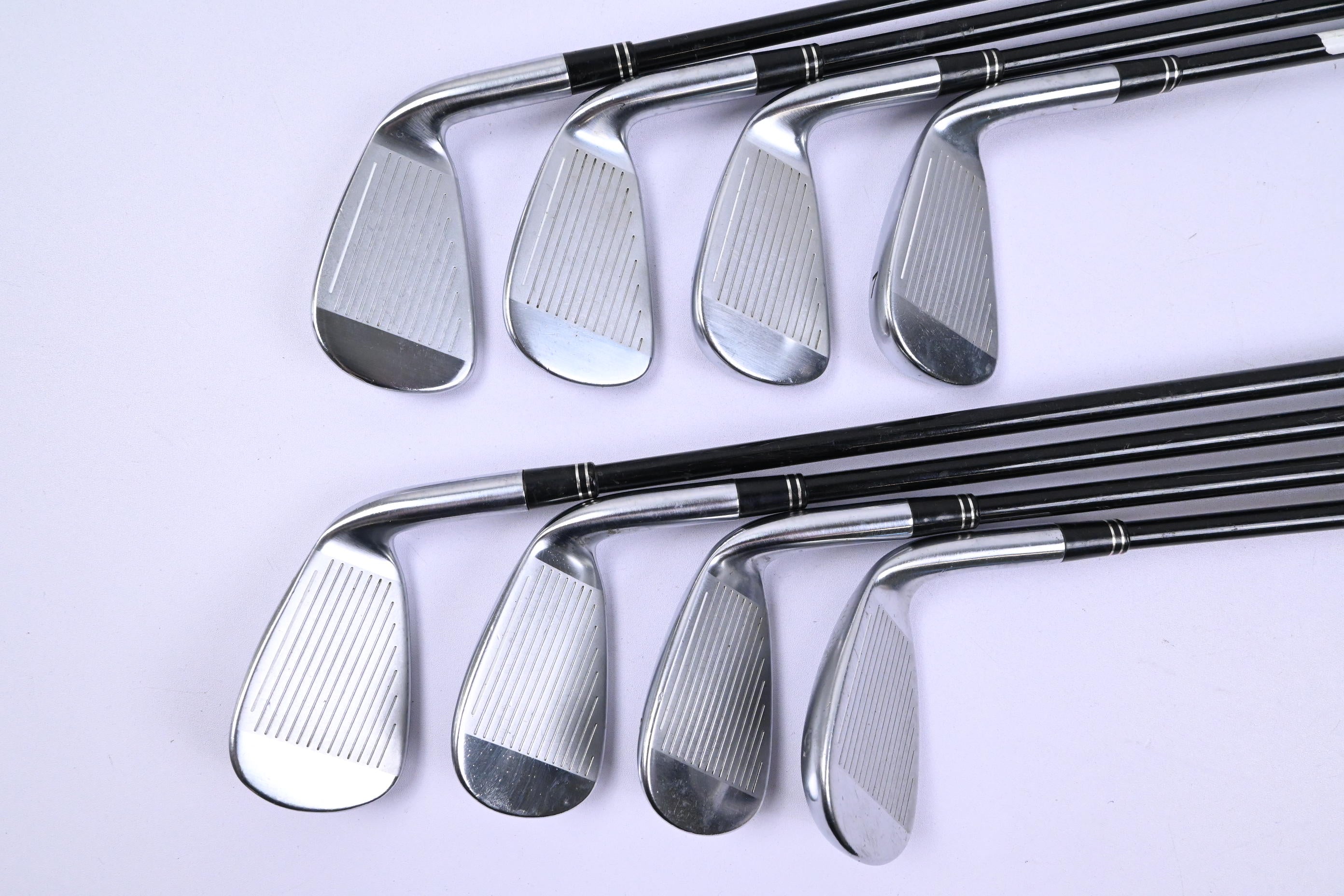 Left Hand Taylormade Tour Burner Irons / 4-PW+SW / Regular Flex REAX 65 Shafts