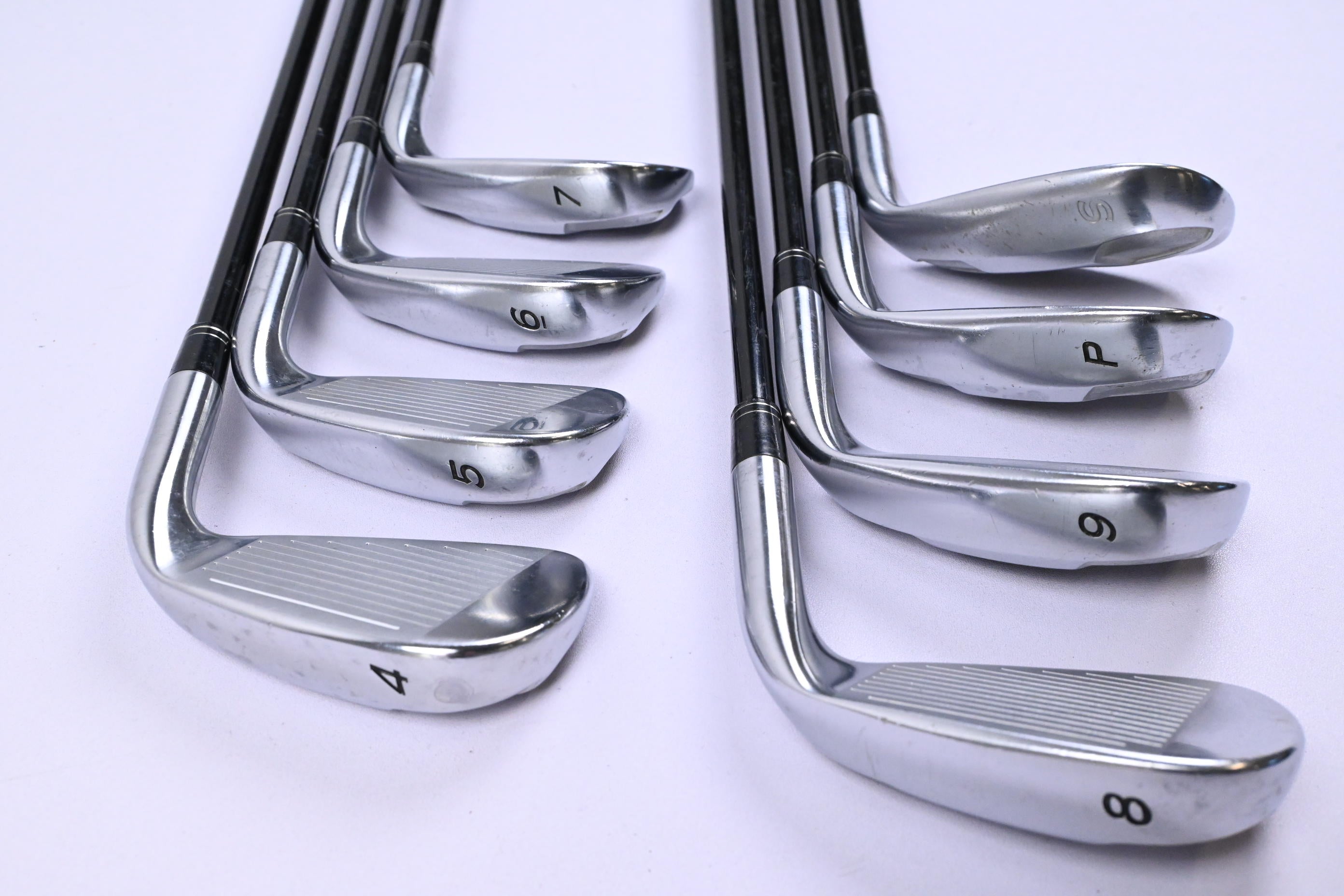 Left Hand Taylormade Tour Burner Irons / 4-PW+SW / Regular Flex REAX 65 Shafts