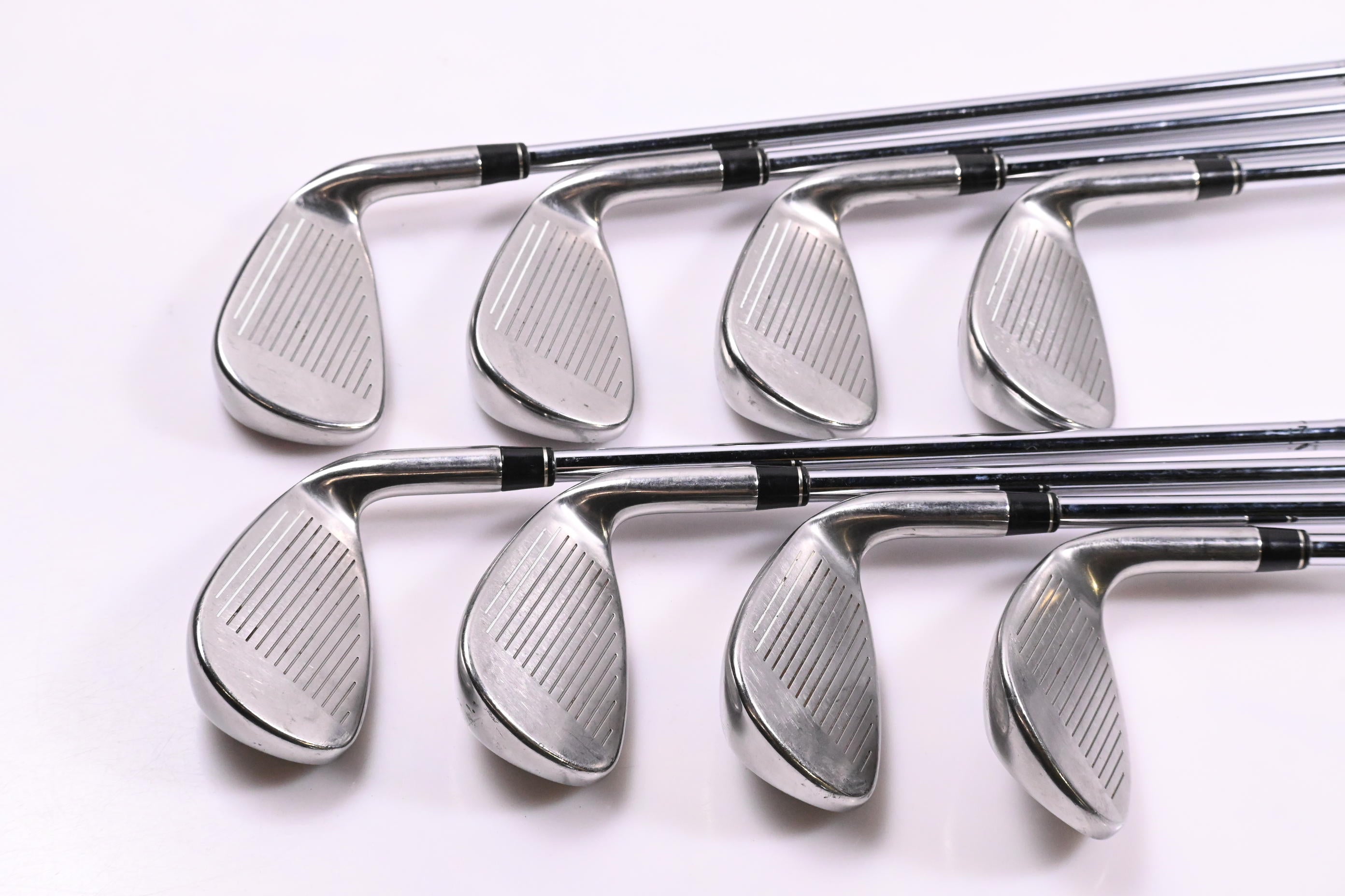 Left Hand Taylormade R7 Draw Irons / 4-PW+SW / Regular Flex Taylormade T-Step 90