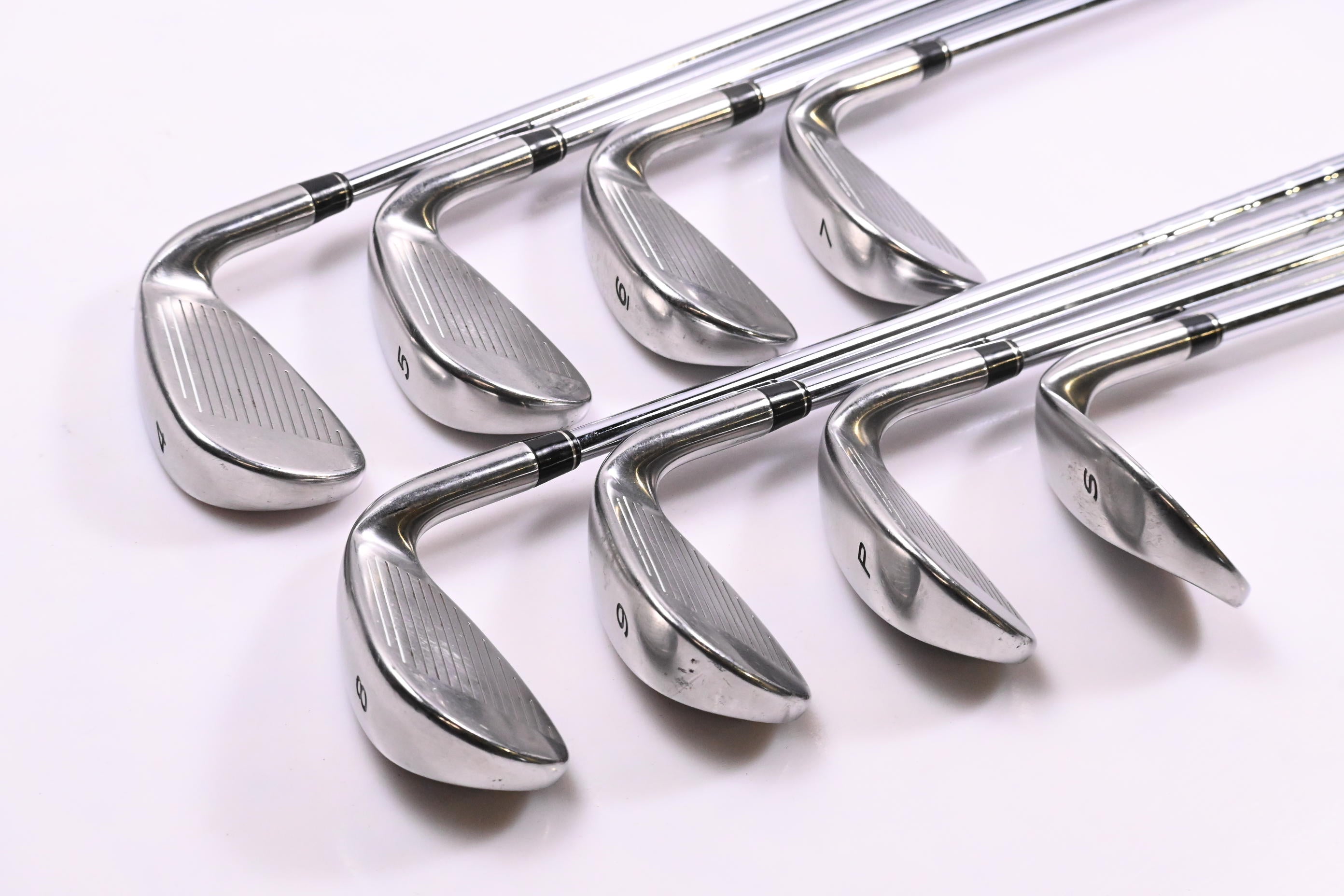 Left Hand Taylormade R7 Draw Irons / 4-PW+SW / Regular Flex Taylormade T-Step 90