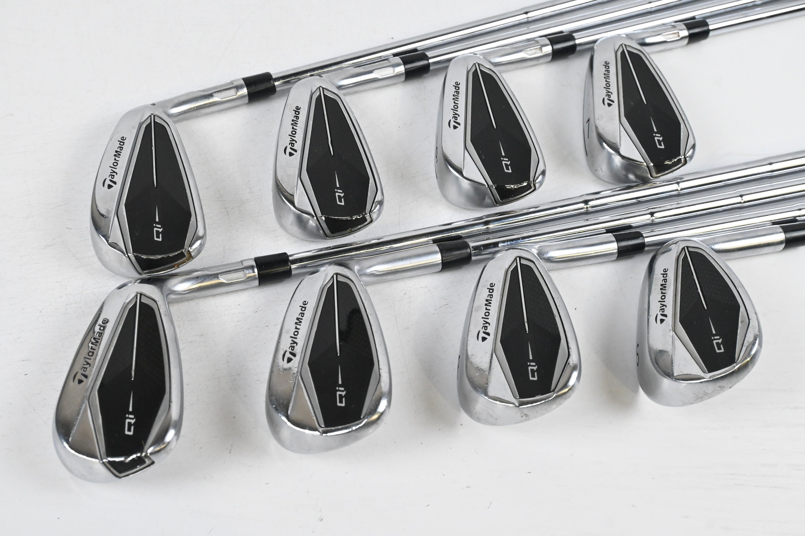 Taylormade Qi Irons / 4-PW+SW / X-Flex Dynamic Gold Mid 115 Shafts