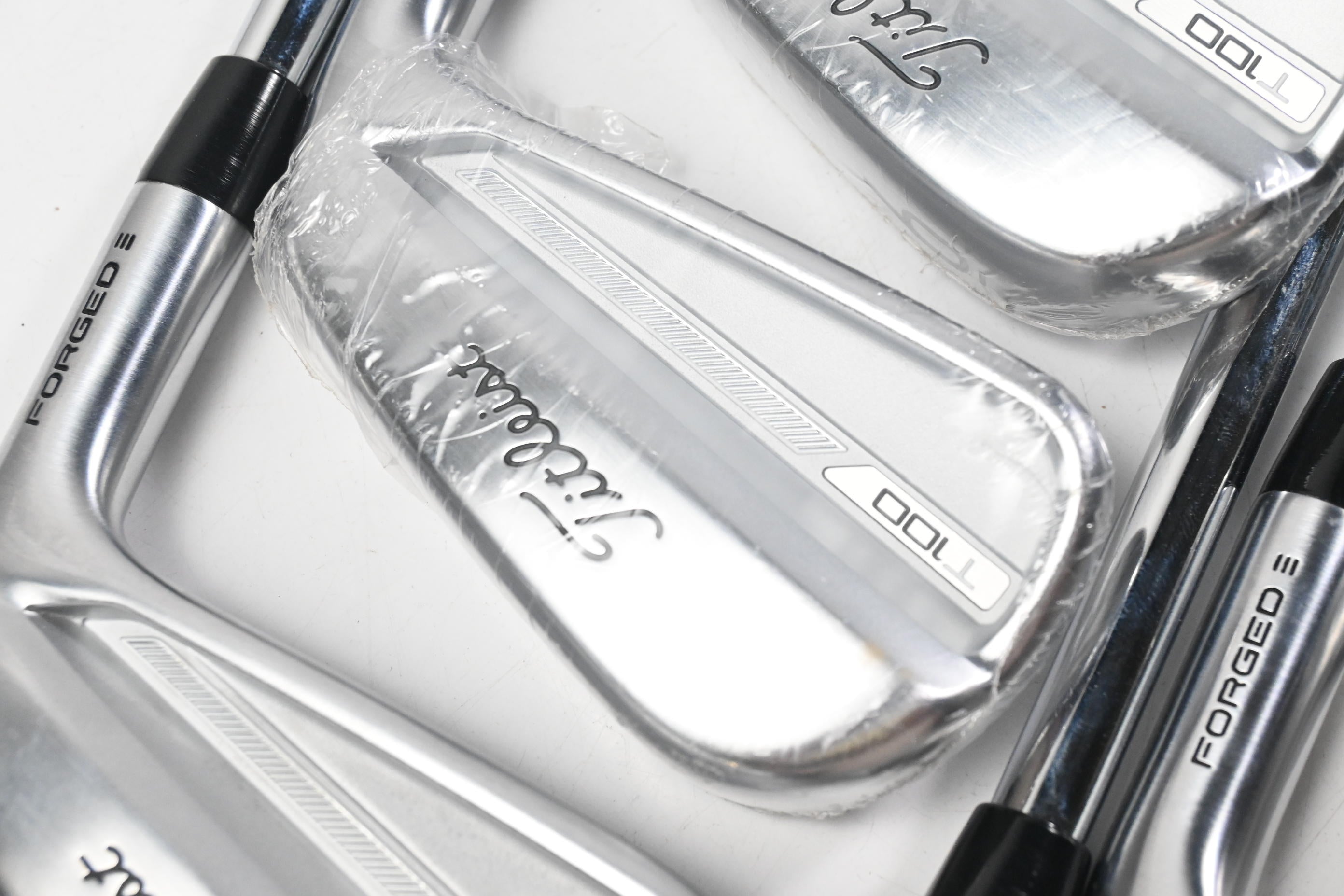 Titleist T100 2023 Irons / 4-PW / Stiff Flex AMT Tour White S300 Shafts