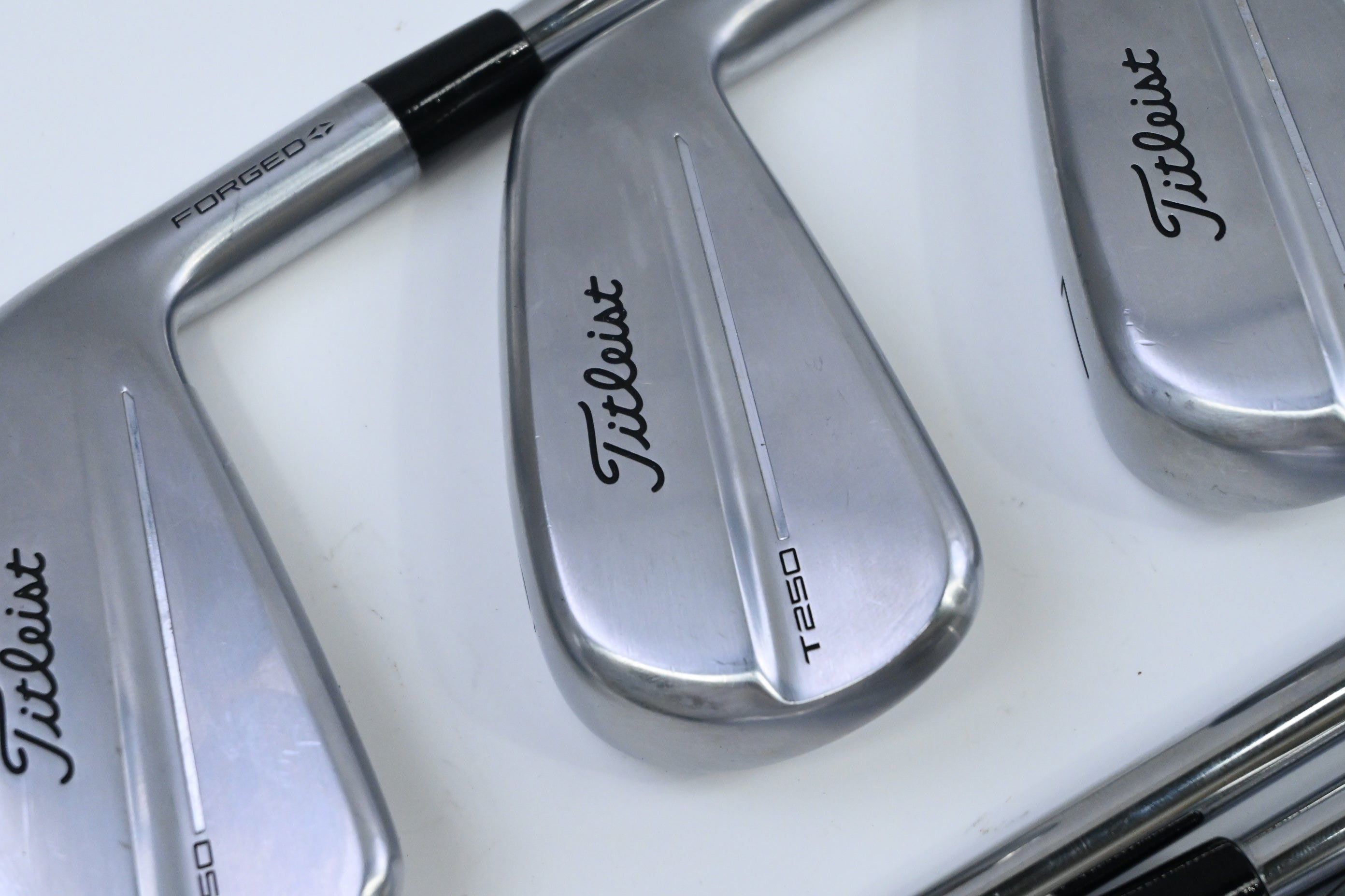 Titleist T250 2025 Irons / 5-PW+48° / Regular Flex AMT White R300 Shafts
