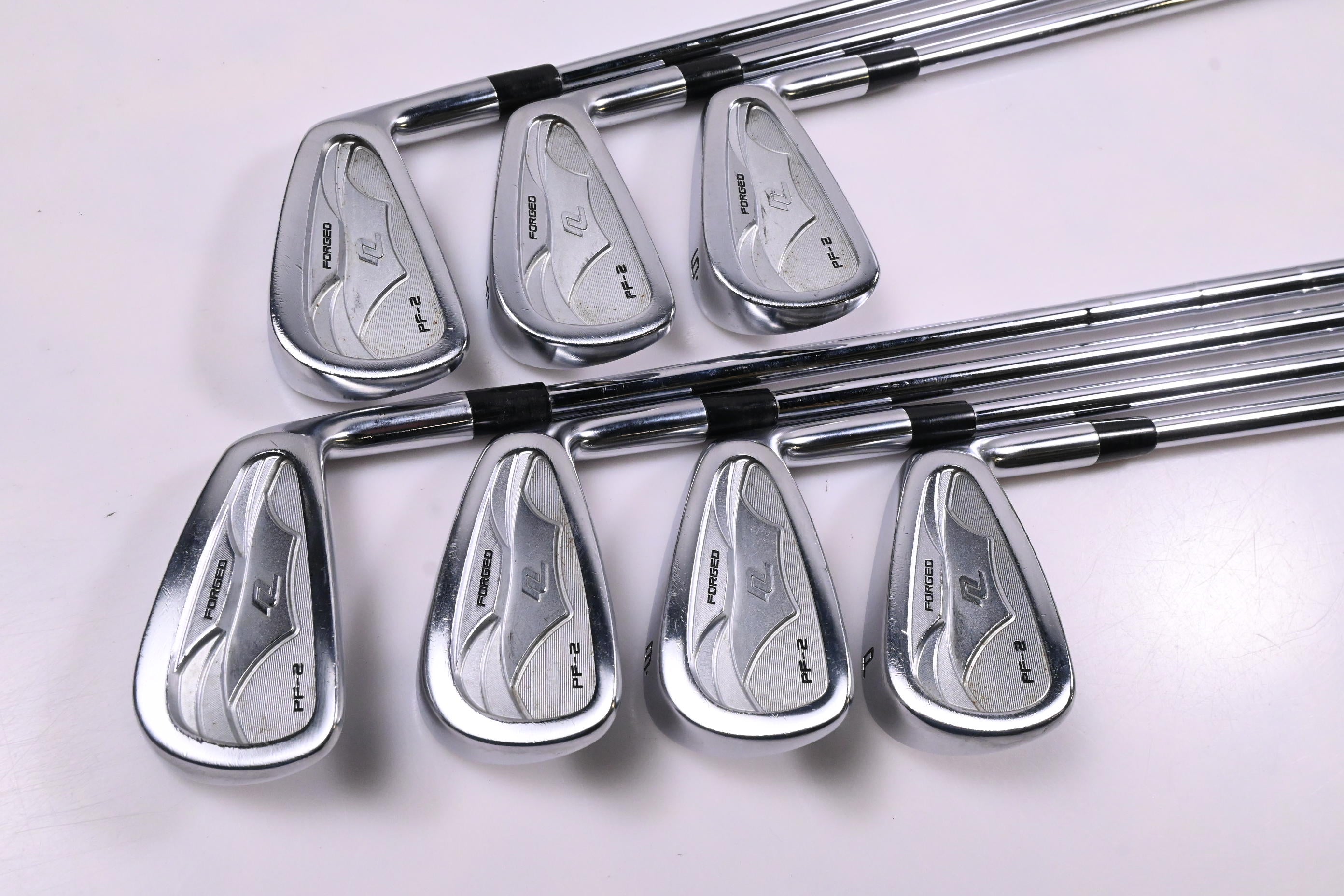 New Level PF-2 Irons / 4-PW / Stiff Flex AMT Tour White S300 Shafts