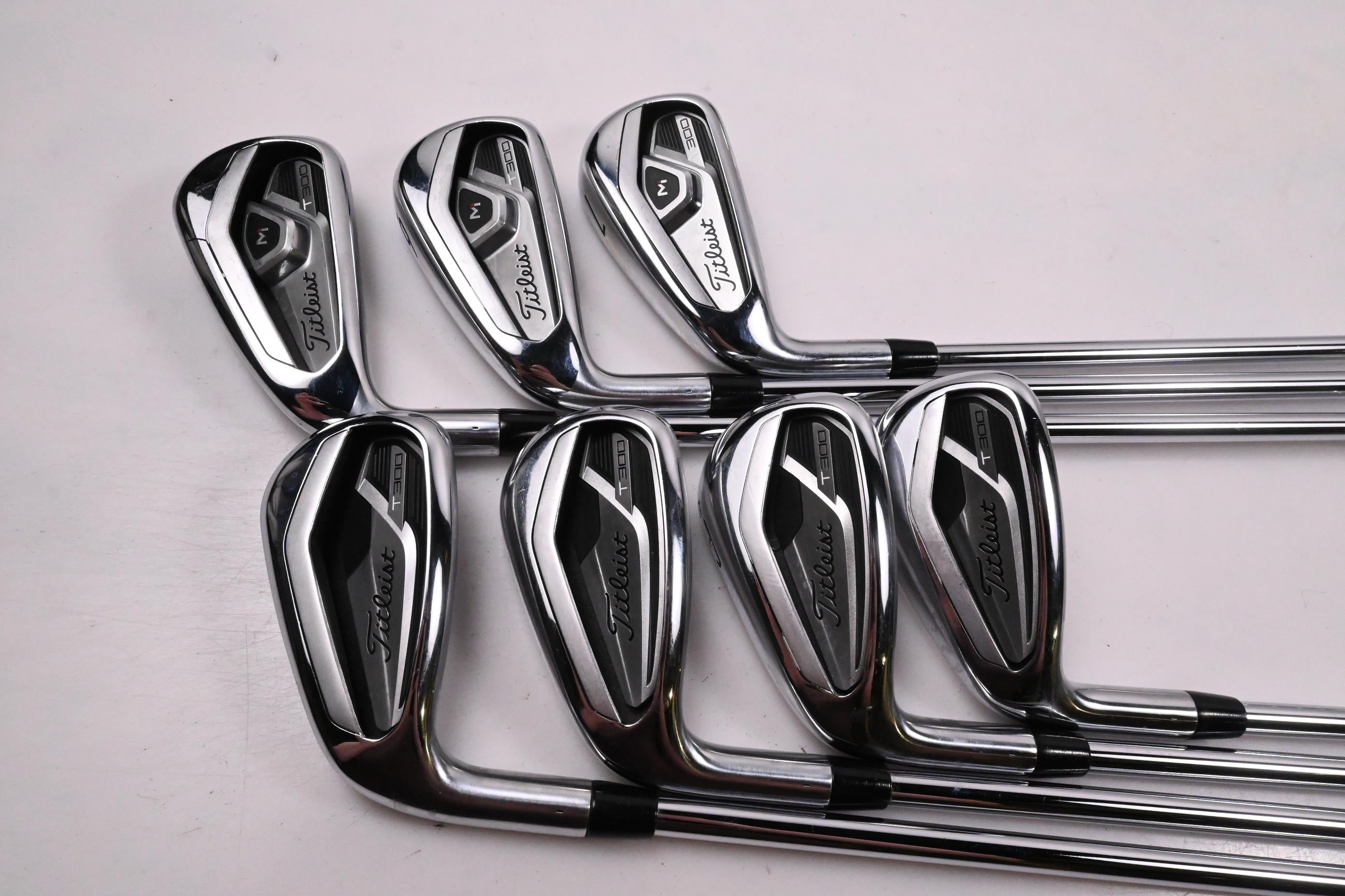 Left Hand Titleist T300 2021 Irons / 5-PW+48° / Regular Flex AMT Red R300 Shafts