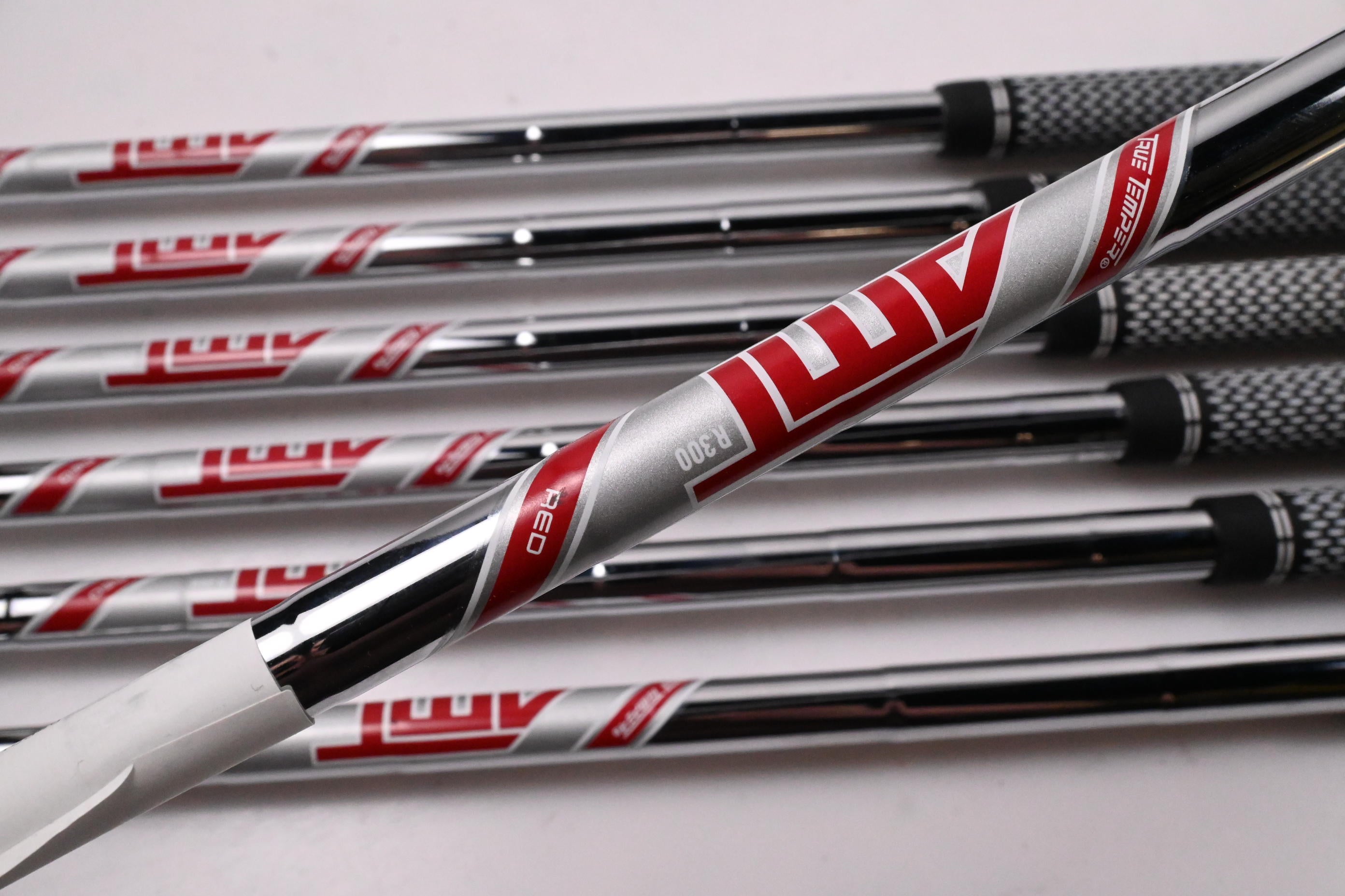 Left Hand Titleist T300 2021 Irons / 5-PW+48° / Regular Flex AMT Red R300 Shafts