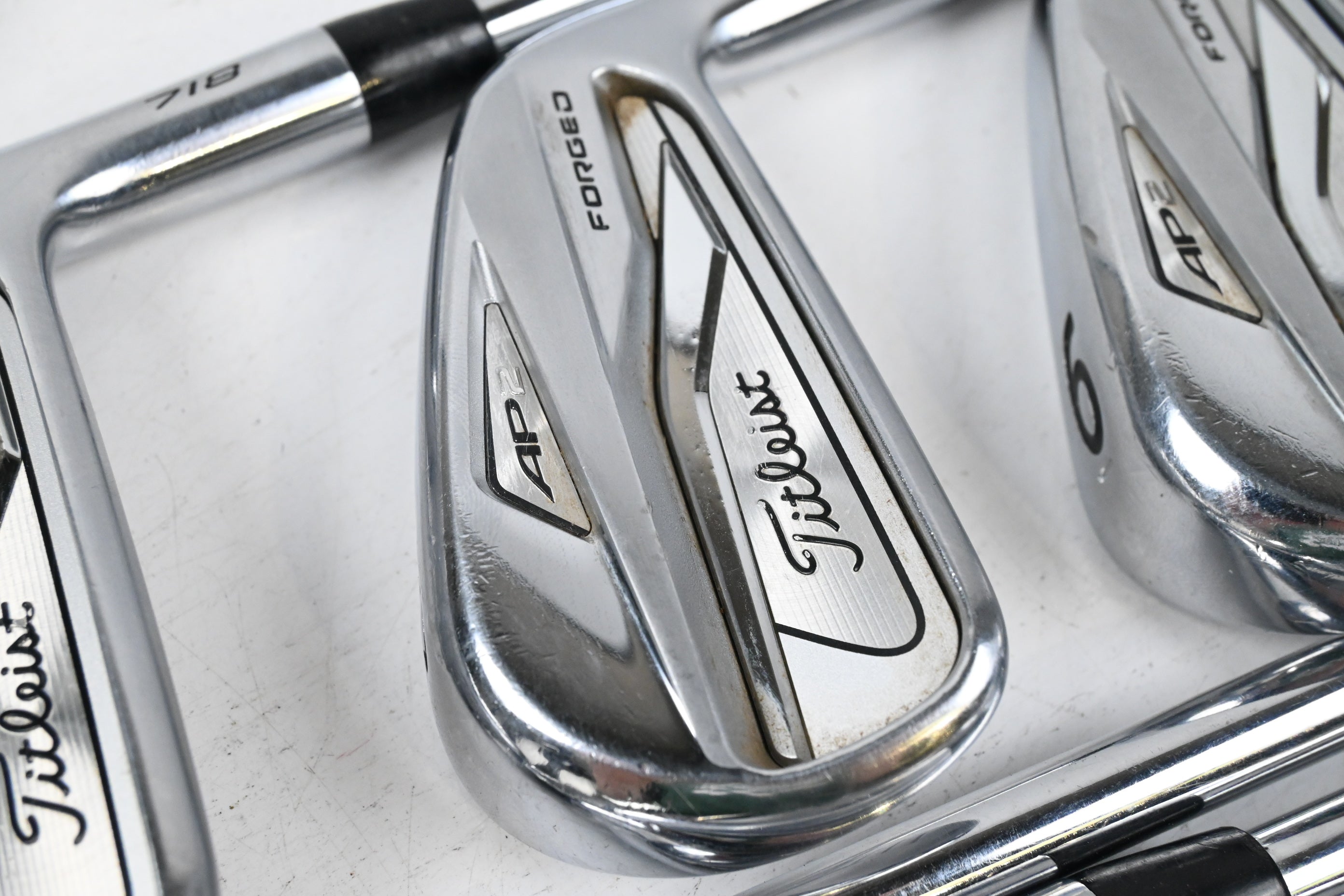 Titleist 718 AP2 Irons / 4-PW / Stiff Flex AMT Tour White S300 Shafts