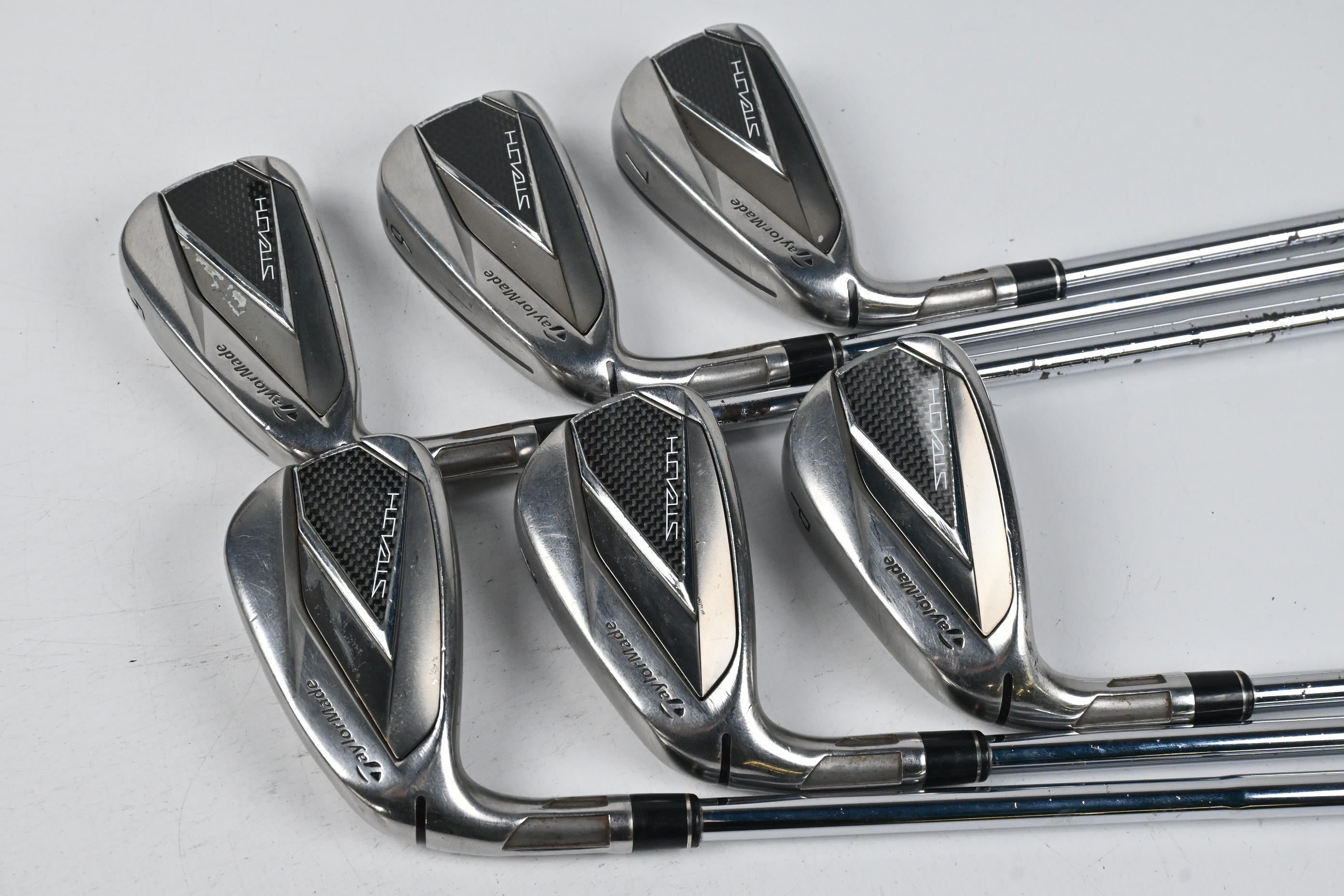Left Hand Taylormade Stealth Irons / 5-PW / Stiff Flex Dynamic Gold S300 Shafts