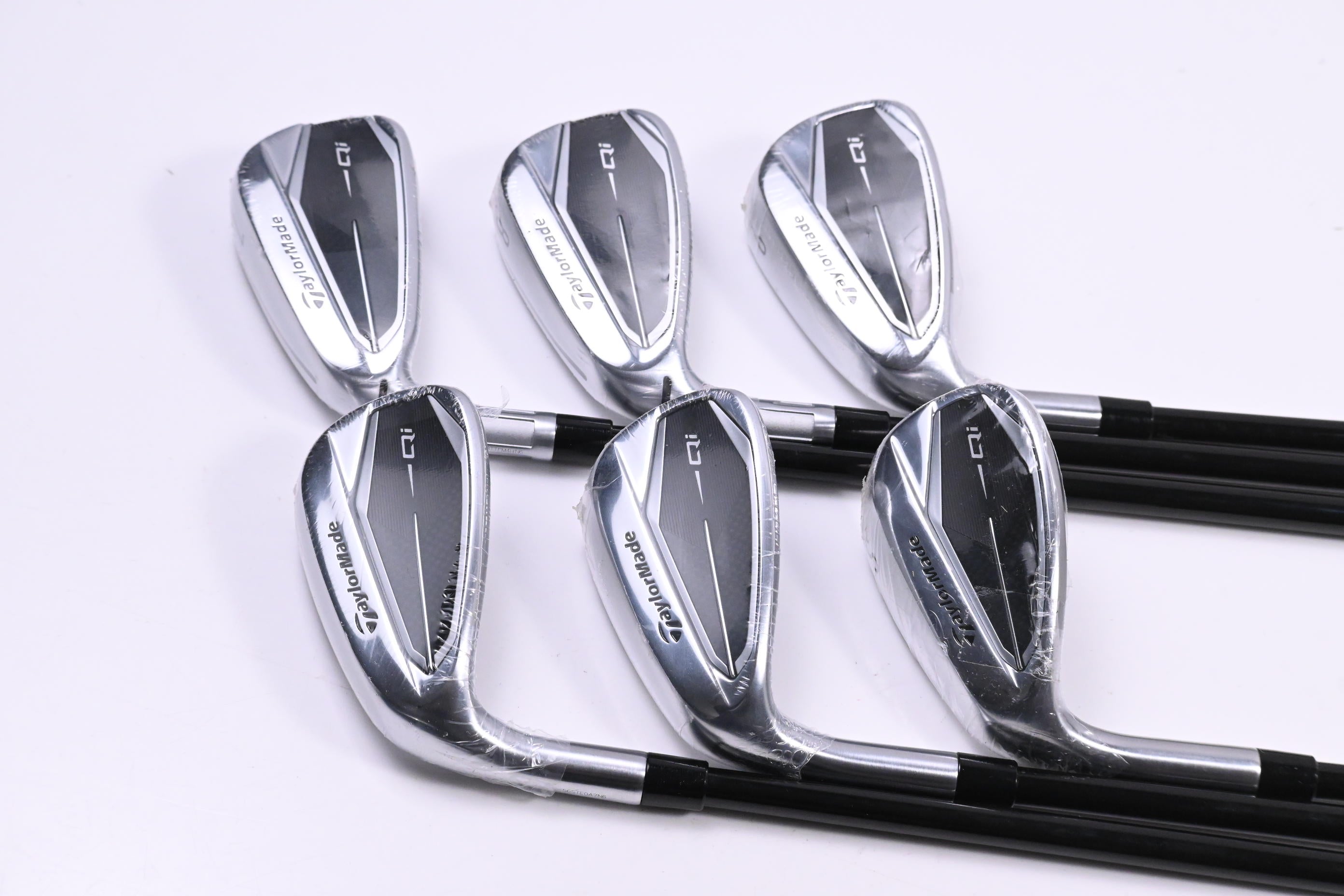 Left Hand Taylormade Qi Irons / 7-PW+AW+SW / Senior Flex Ventus TR Blue 5