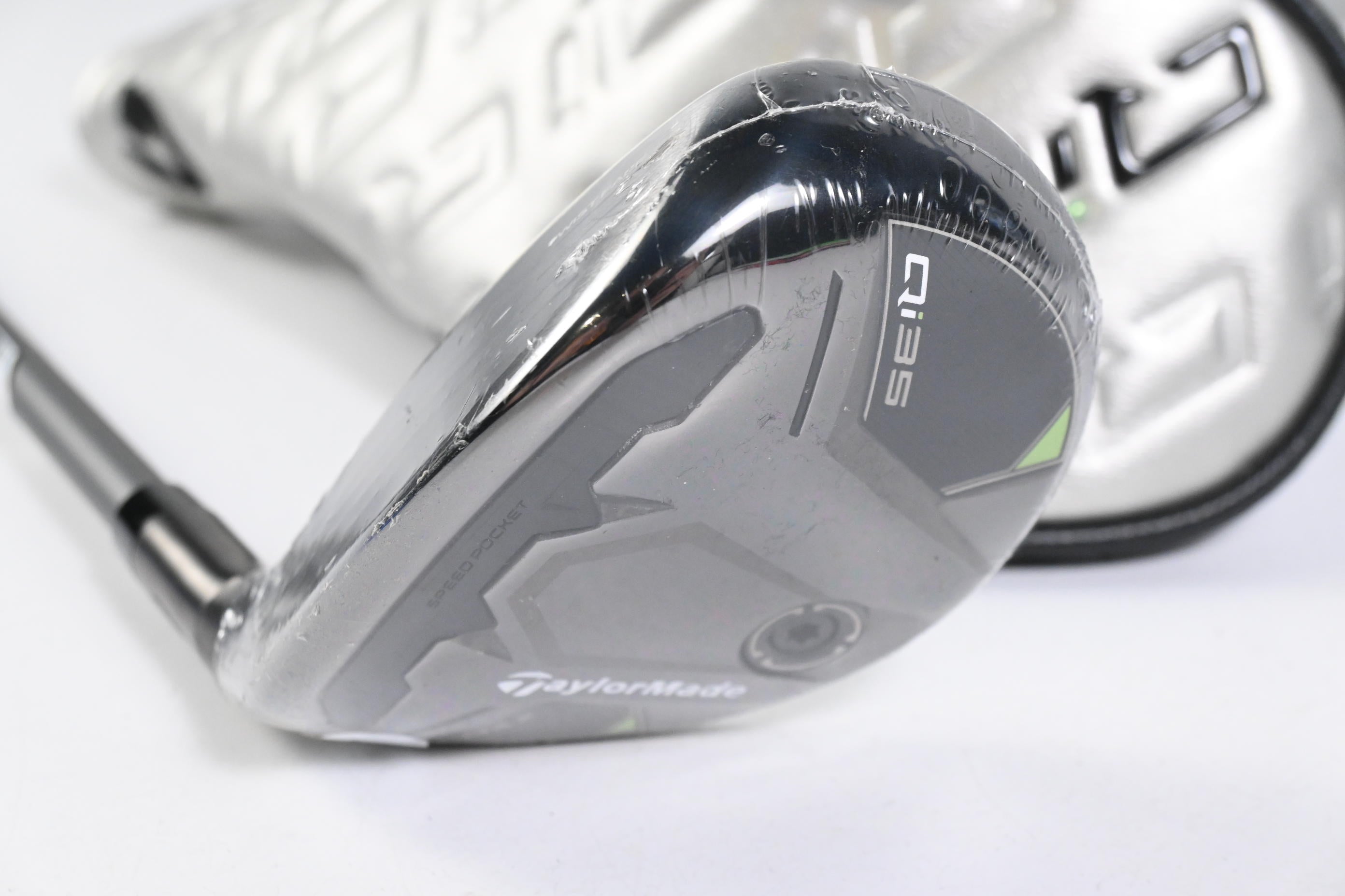 Left Hand Taylormade Qi35 #4 Hybrid / 23 Degree / Regular Flex Air Speeder 50