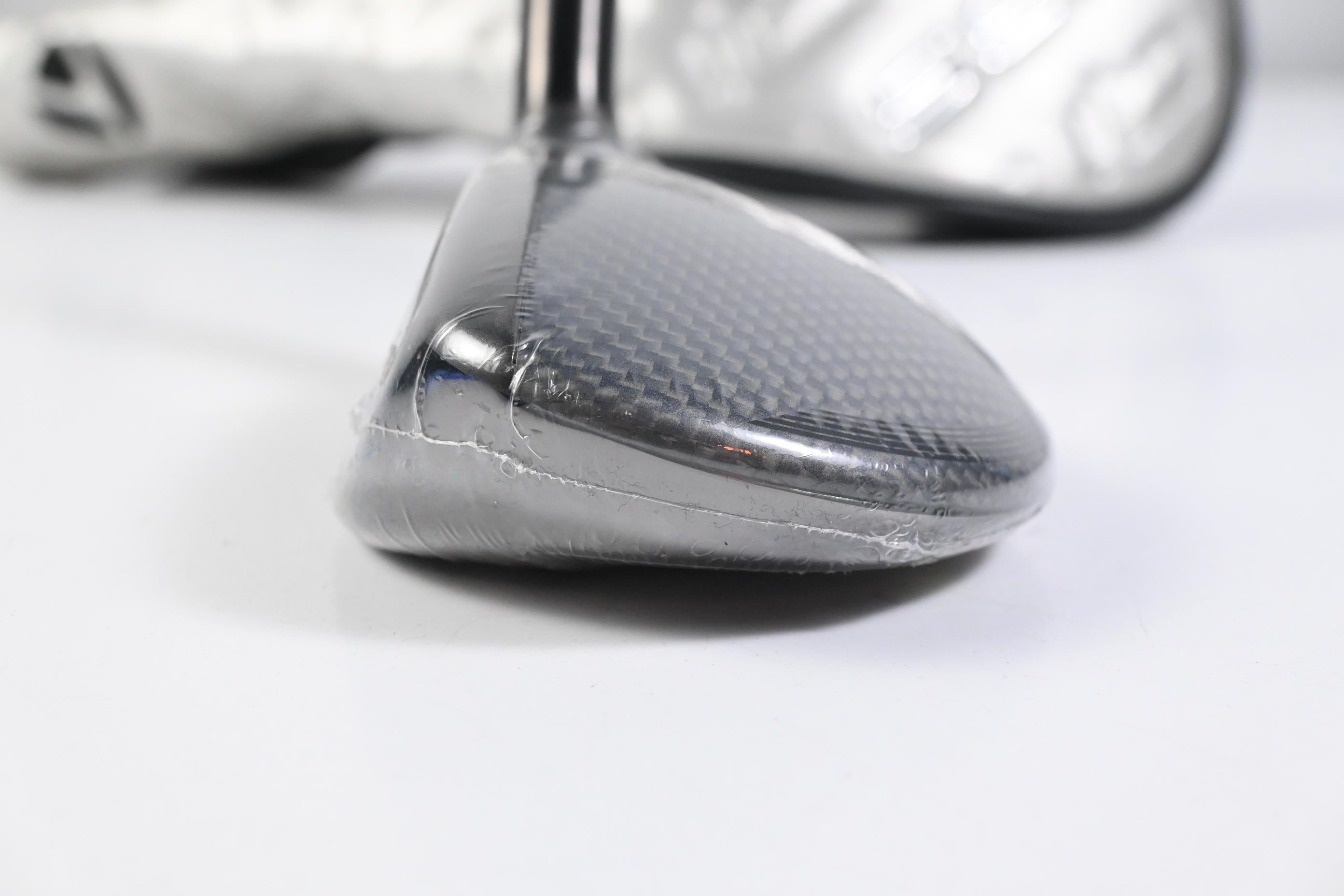 Left Hand Taylormade Qi35 #4 Hybrid / 23 Degree / Regular Flex Air Speeder 50