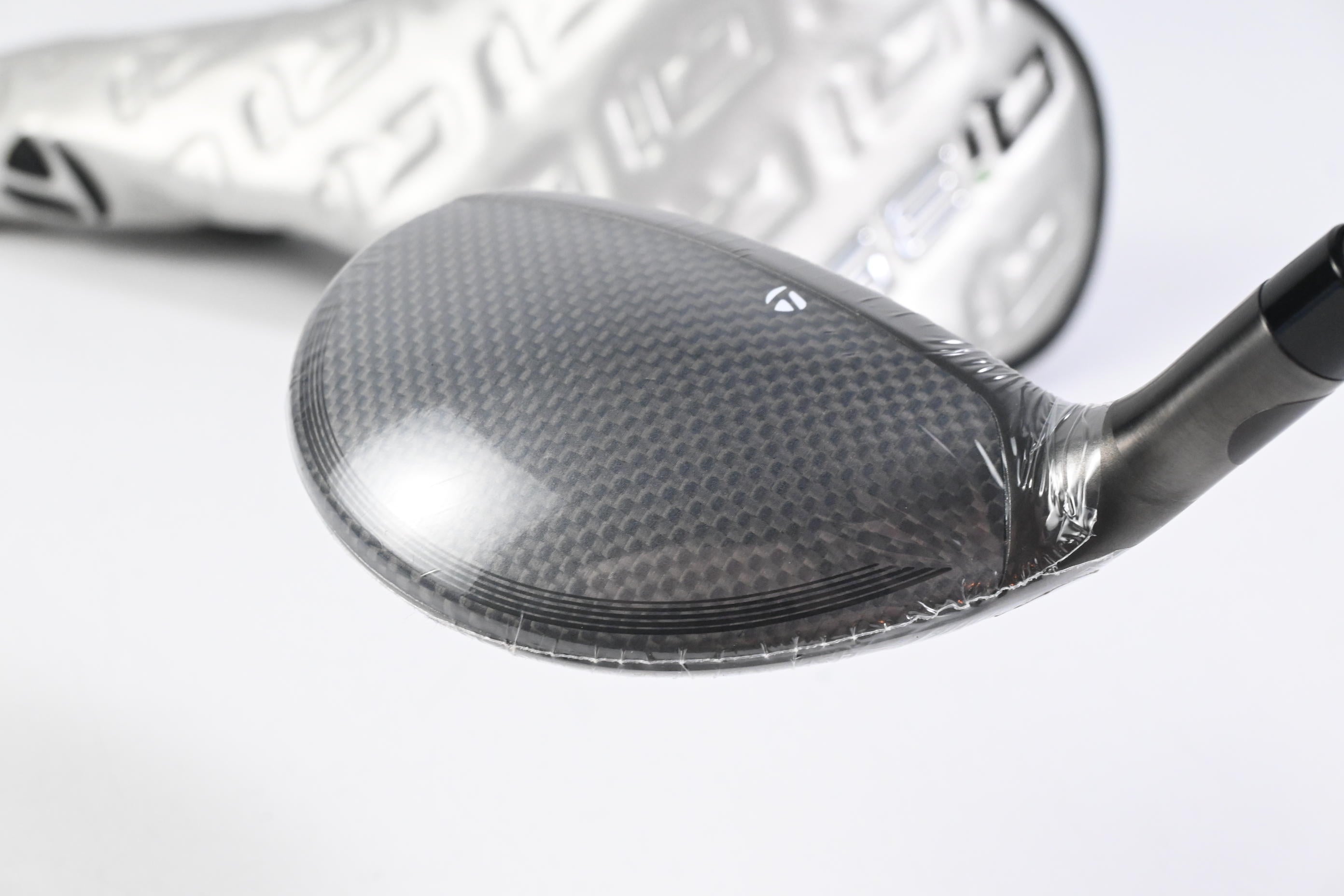 Left Hand Taylormade Qi35 #4 Hybrid / 23 Degree / Regular Flex Air Speeder 50