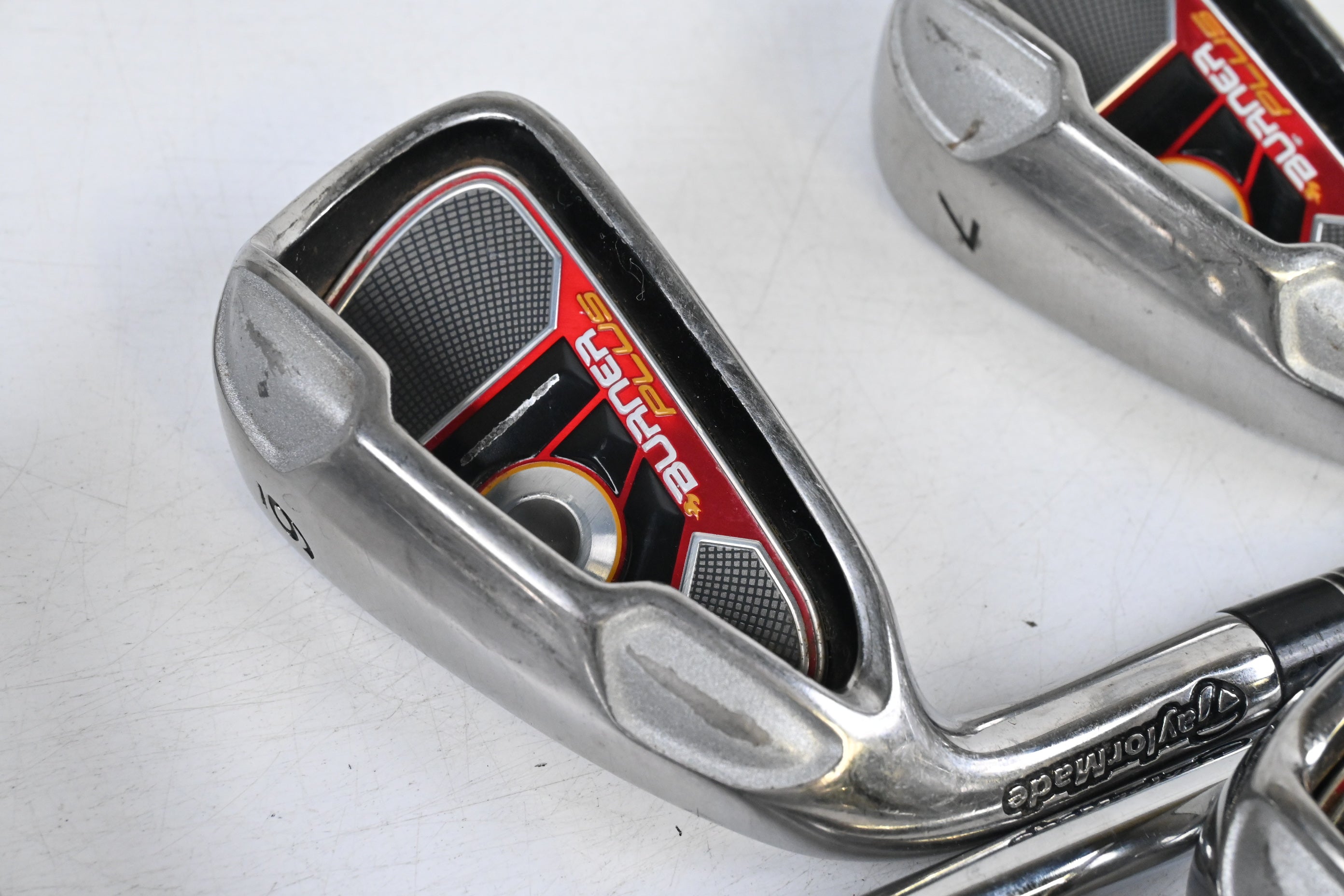 Left Hand Taylormade Burner Plus Irons / 5-PW+SW / Stiff Flex Burner 85 Shafts