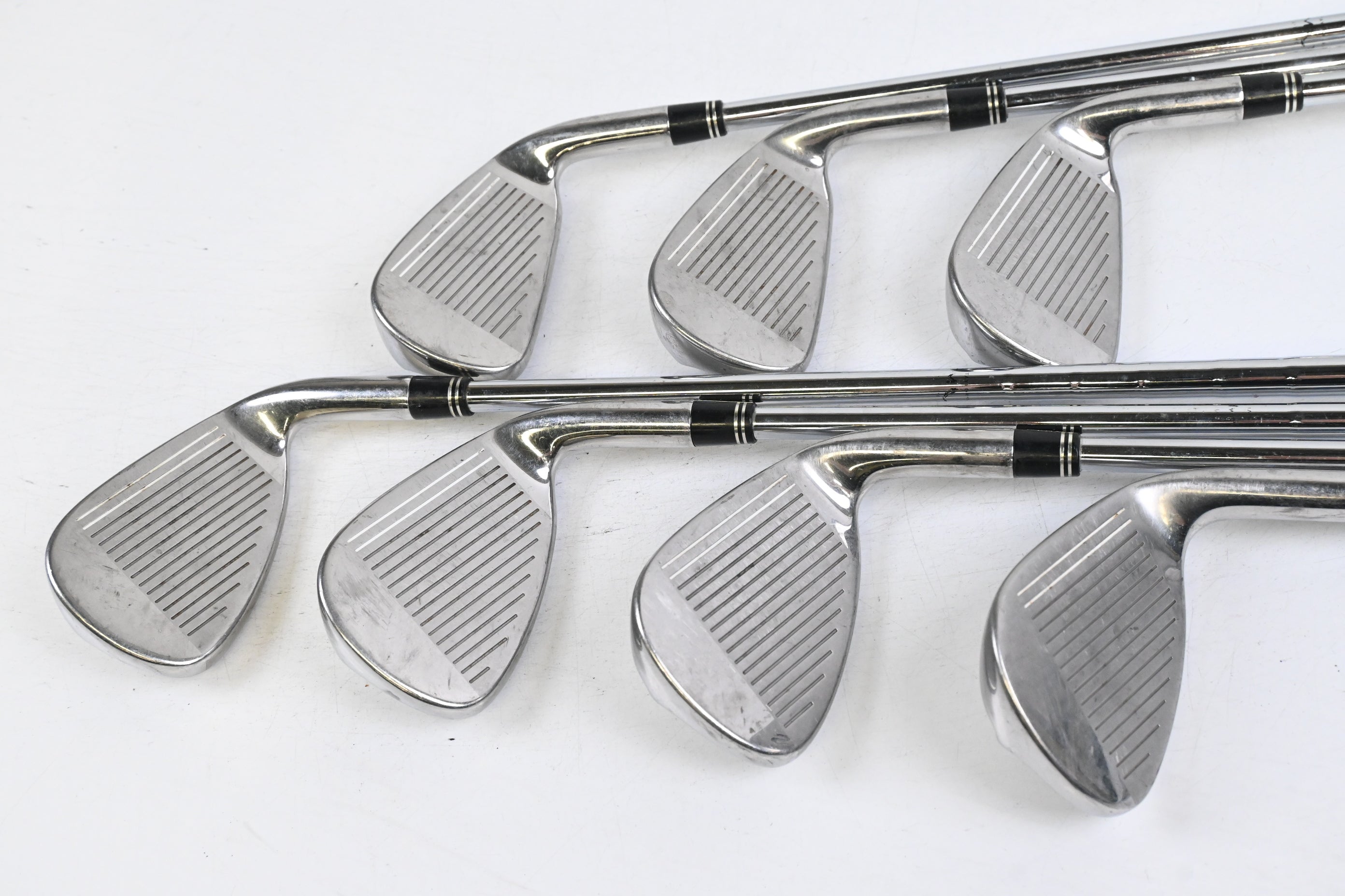 Left Hand Taylormade Burner Plus Irons / 5-PW+SW / Stiff Flex Burner 85 Shafts
