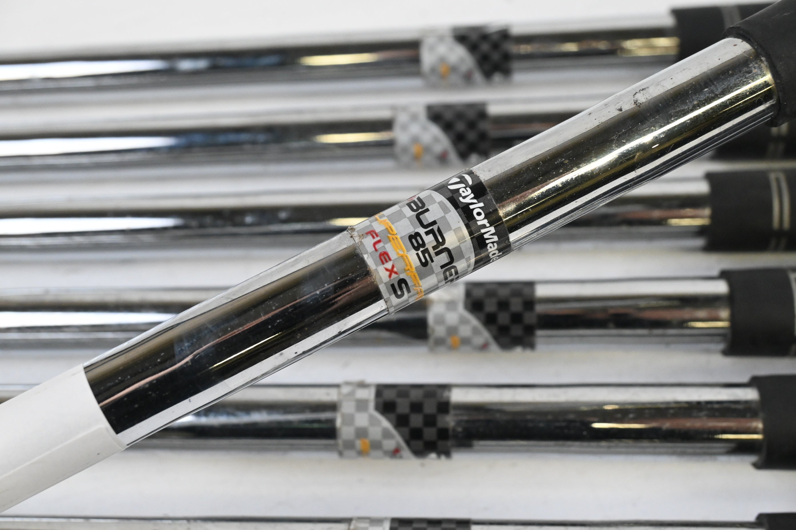 Left Hand Taylormade Burner Plus Irons / 5-PW+SW / Stiff Flex Burner 85 Shafts