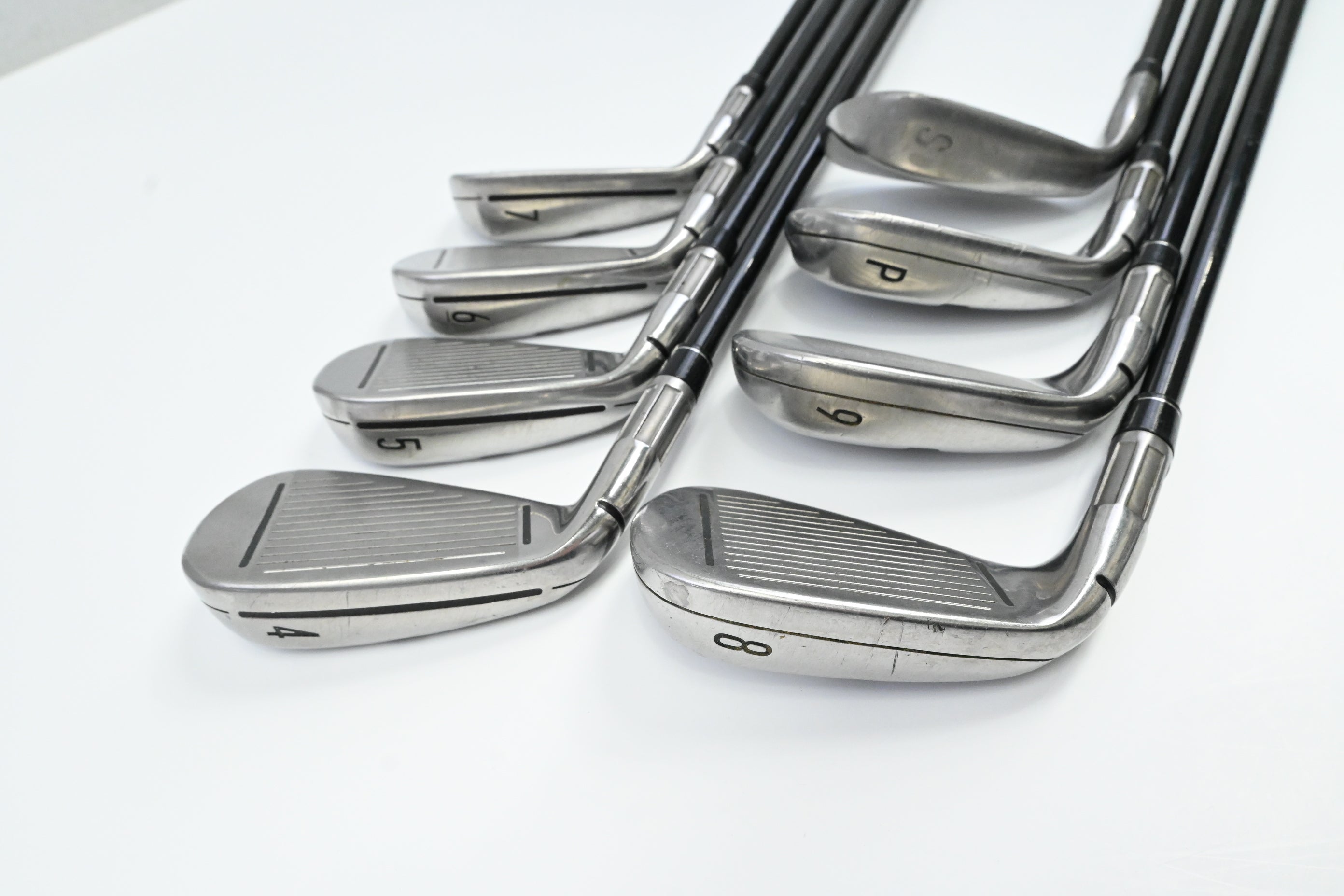 Taylormade M4 Irons / 4-PW+SW / Stiff Flex Fujikura Atmos Red 7 Shafts