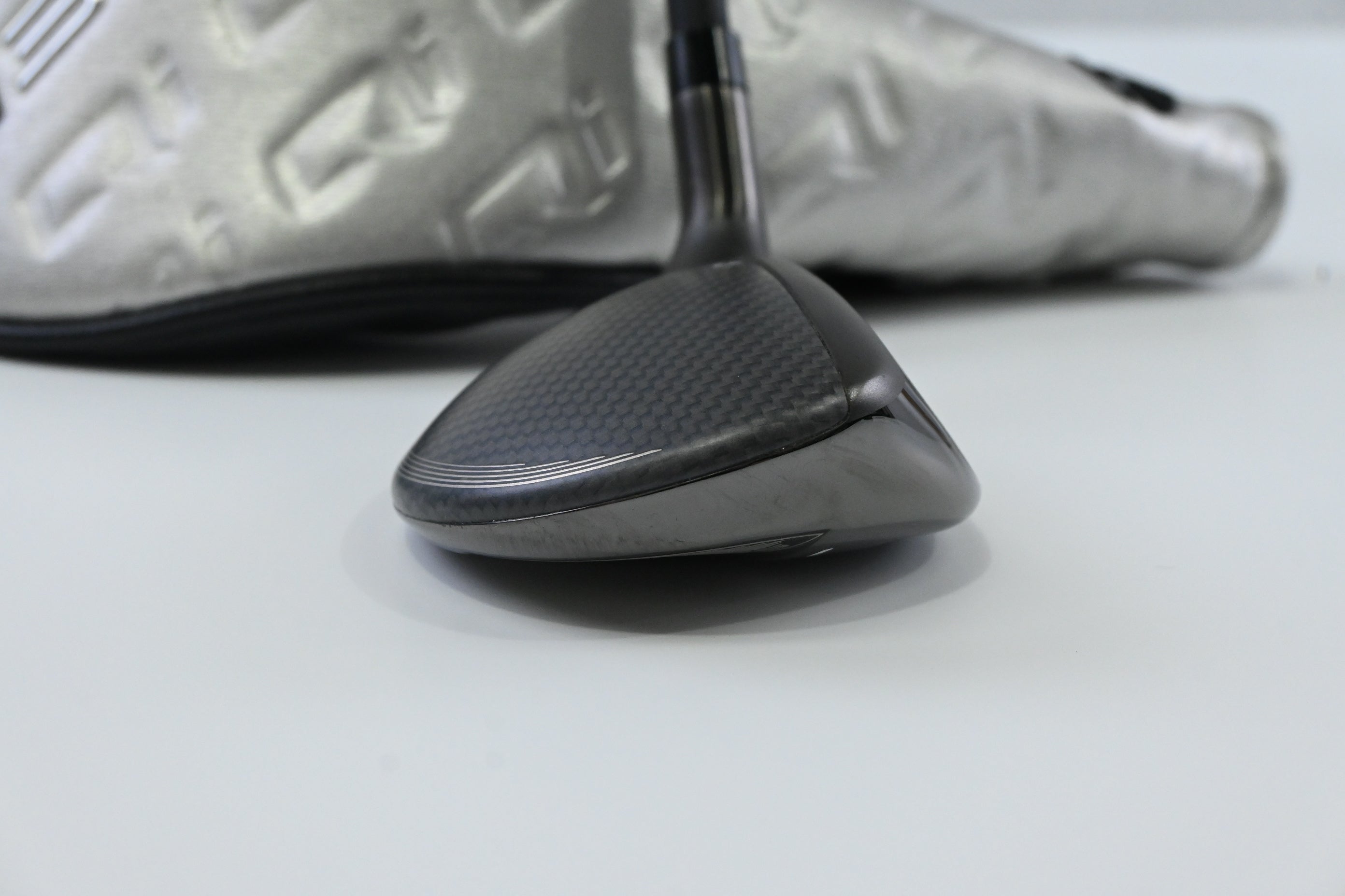 Taylormade Qi35 Max Lite #7 Hybrid / 35 Degree / Regular Flex Vanquish 5 Shaft