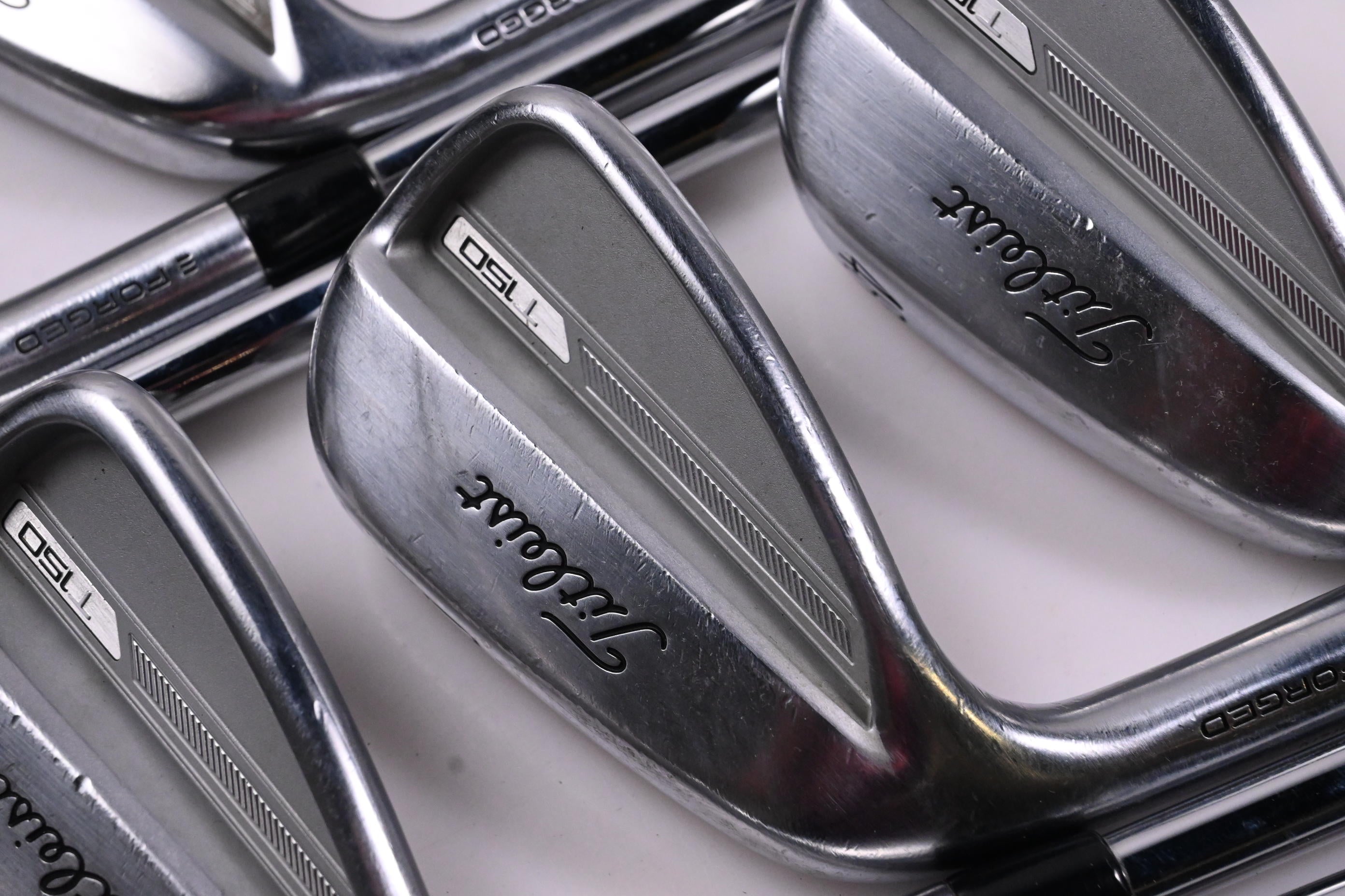 Left Hand Titleist T150 2023 Irons / 4-PW+48° / Stiff Flex True Temper AMT White