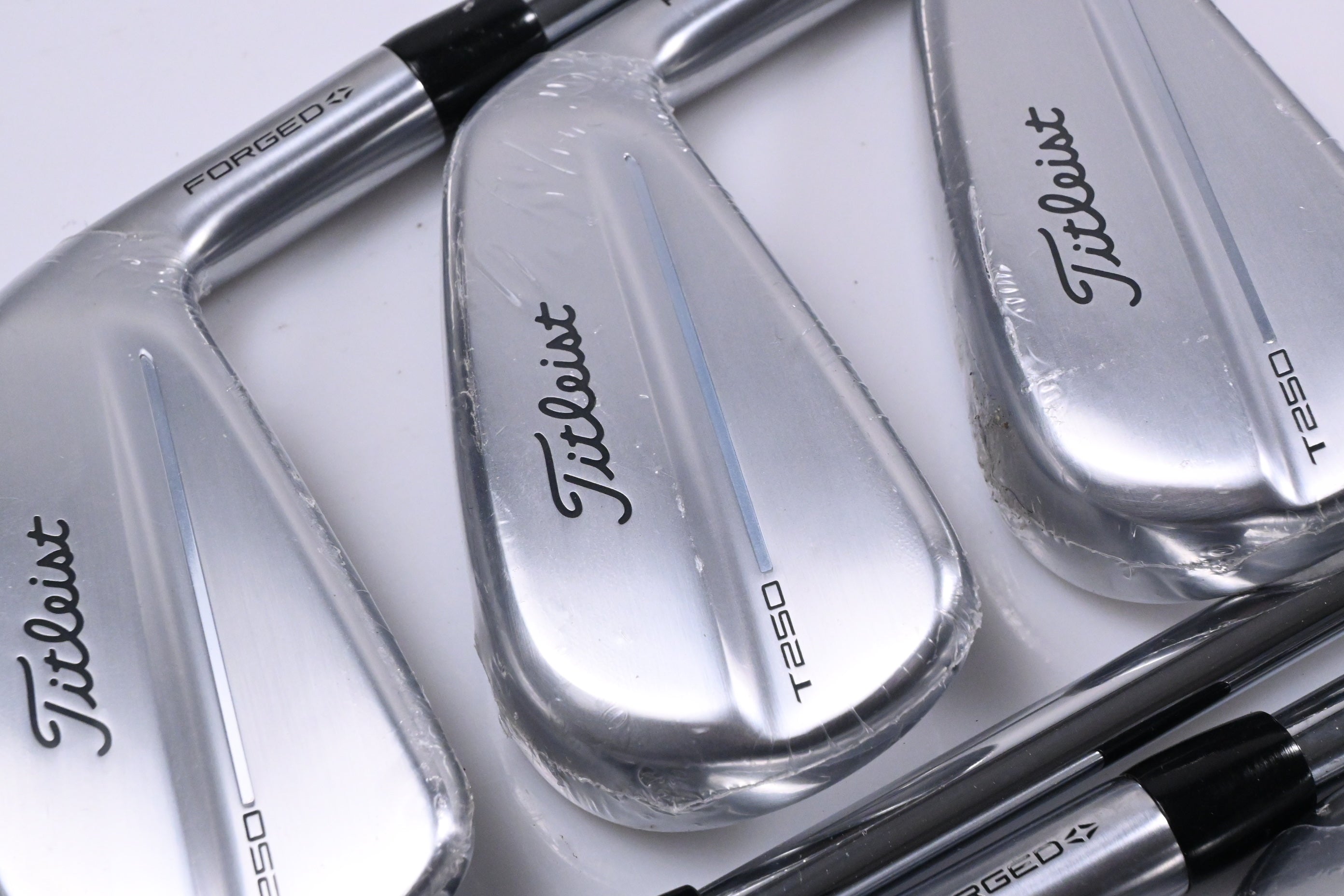 Titleist T250 2025 Irons / 5-PW+GW / Stiff Flex True Temper AMT Black Shafts