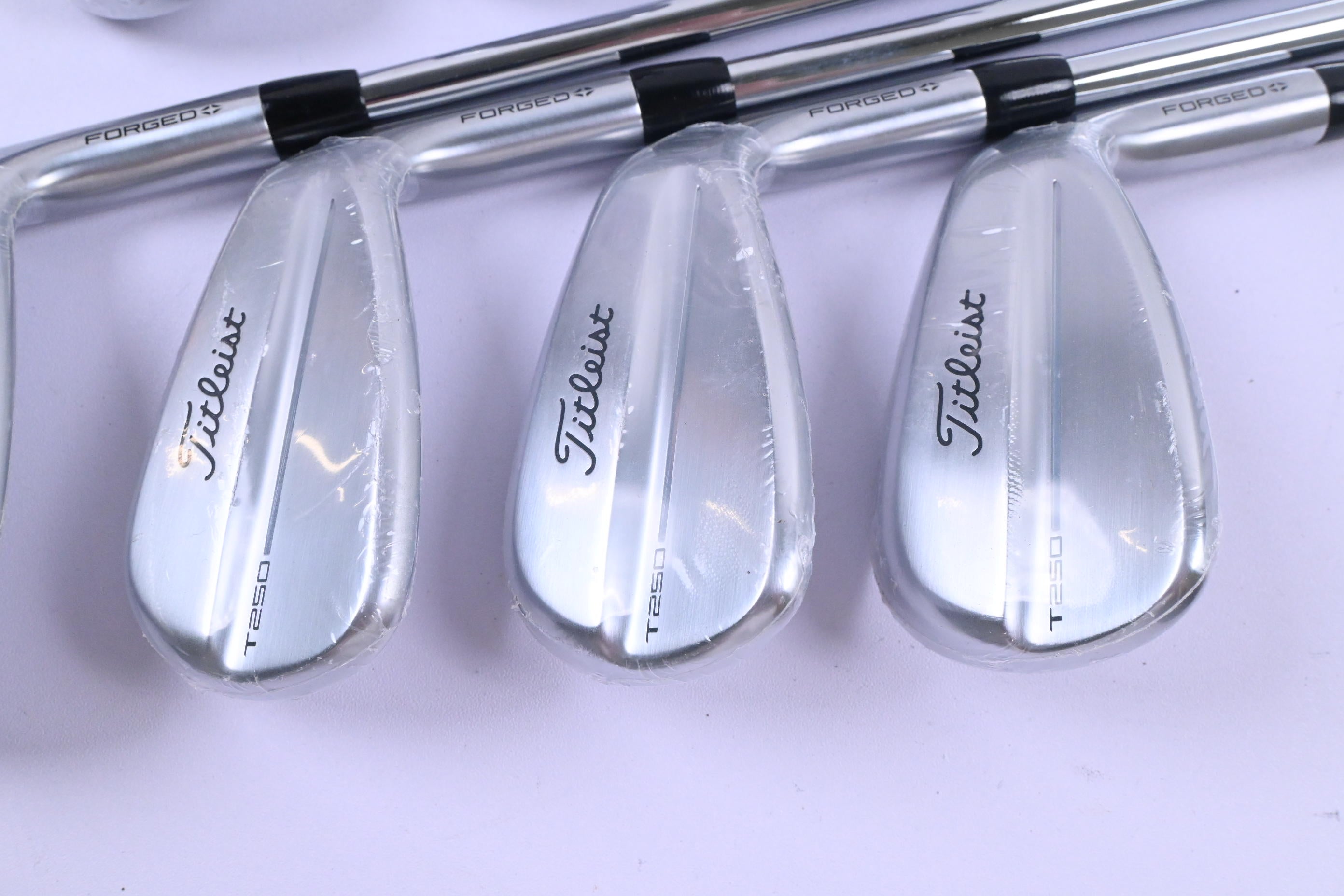 Titleist T250 2025 Irons / 5-PW+48° / Stiff Flex AMT Black Shafts