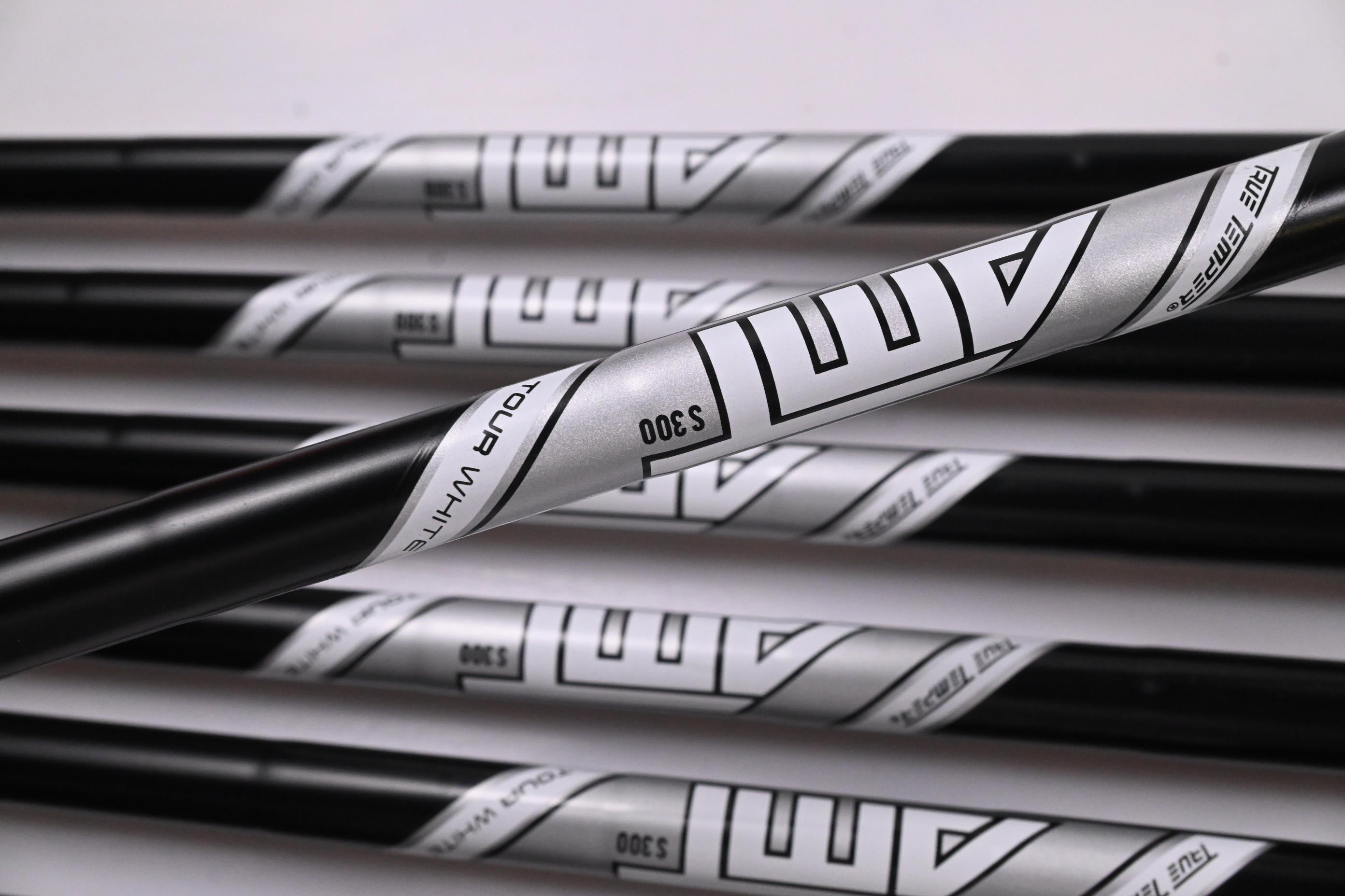 Titleist T100 Black Vapor Irons / 4-PW / Stiff Flex AMT Tour White S300 Shafts