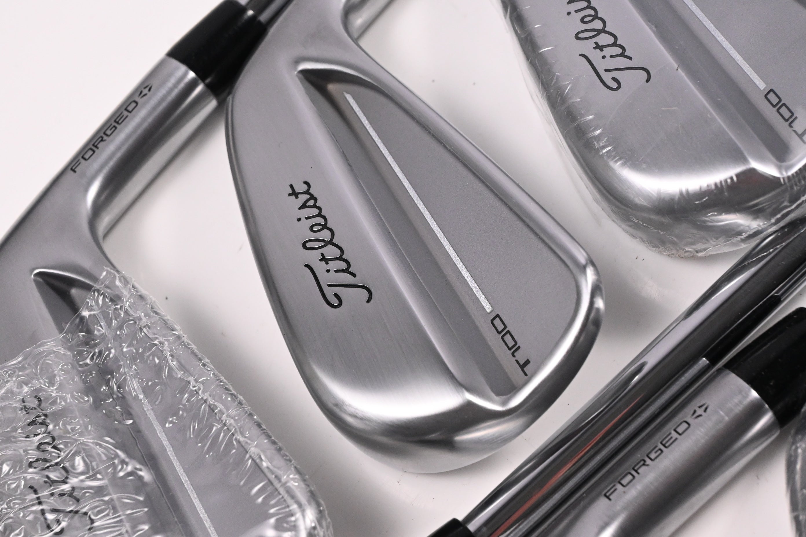 Titleist T100 2025 Irons / 4-PW / Stiff Flex True Temper AMT White Shafts