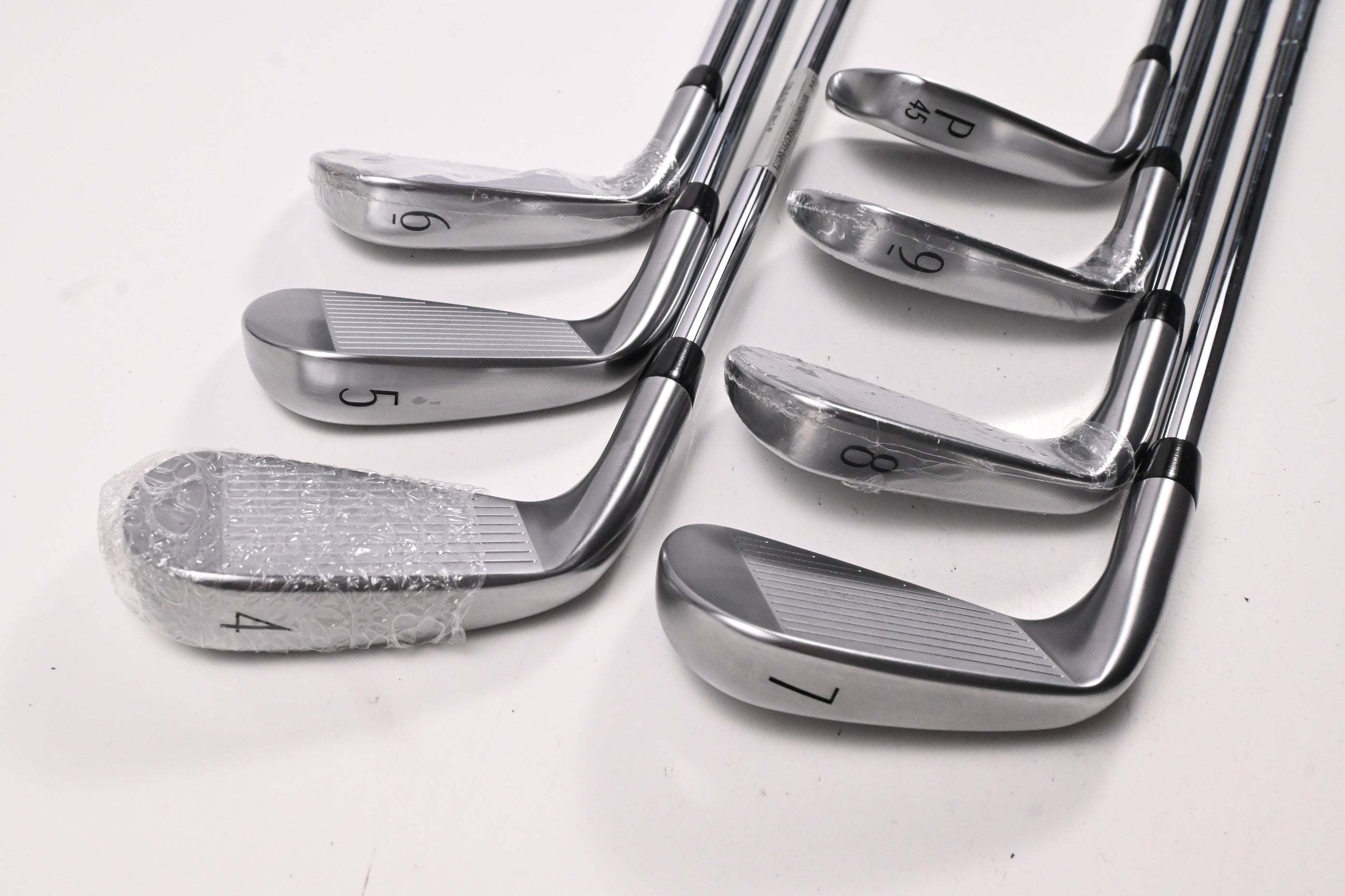 Titleist T100 2025 Irons / 4-PW / Stiff Flex True Temper AMT White Shafts