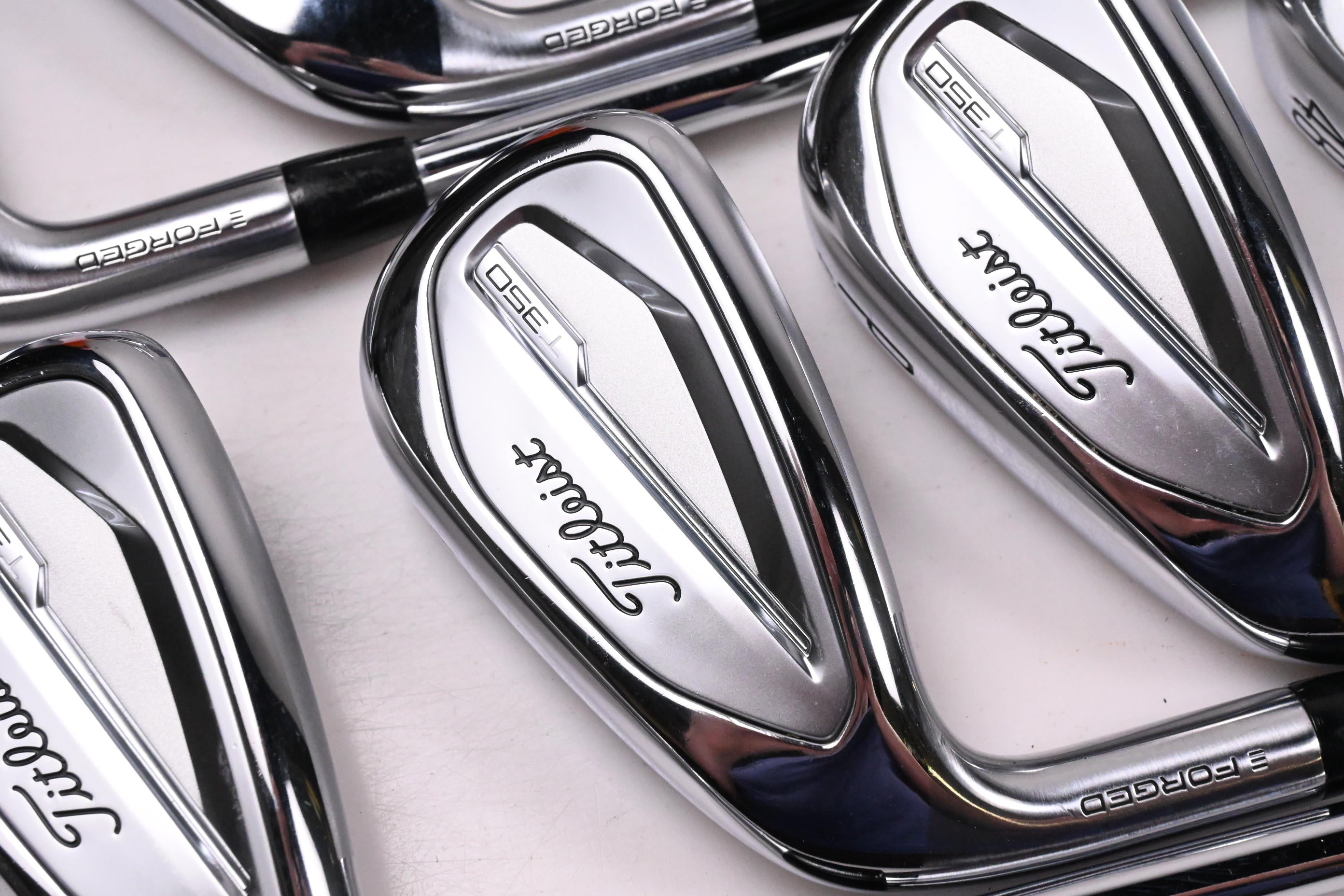 Left Hand Titleist T350 Irons / 5-PW+48° / Regular Flex AMT Red R300 Shafts