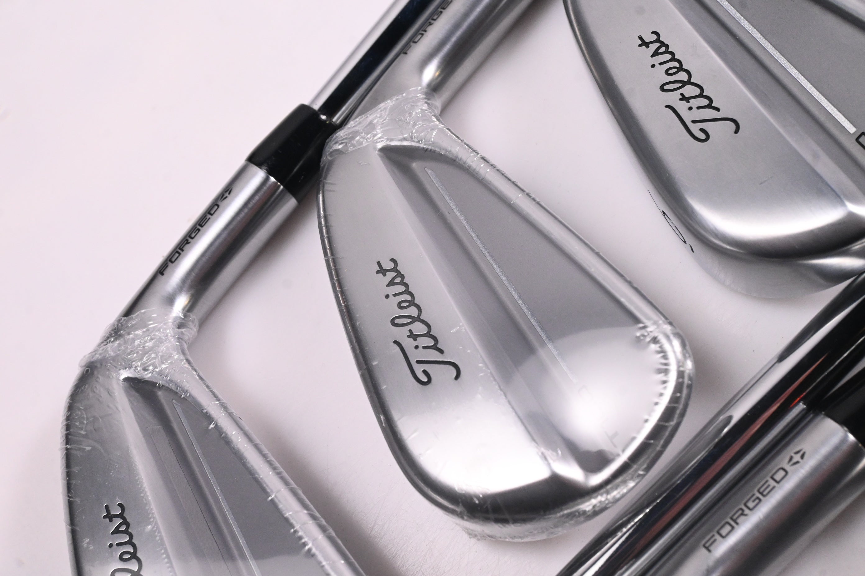Titleist T100 2025 Irons / 4-PW / Stiff Flex AMT White Shafts