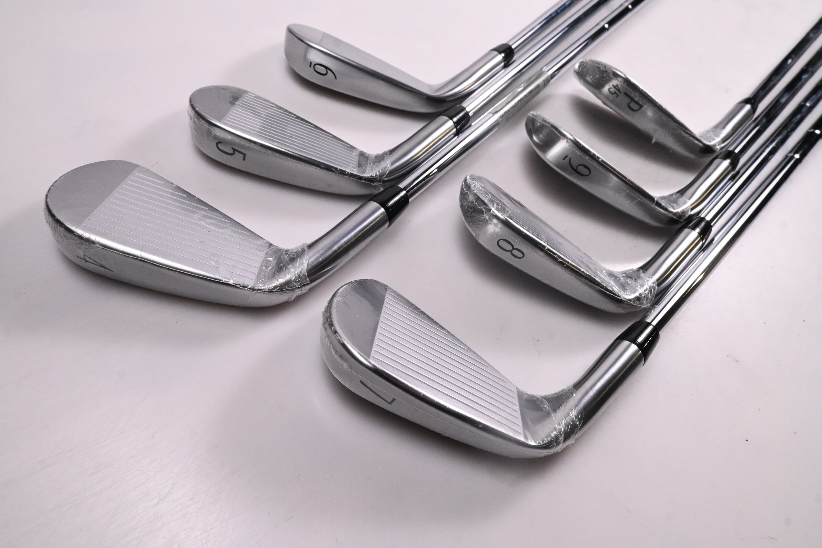 Titleist T100 2025 Irons / 4-PW / Stiff Flex AMT White Shafts